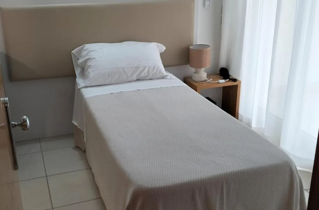 Bed in Hotel Riviera