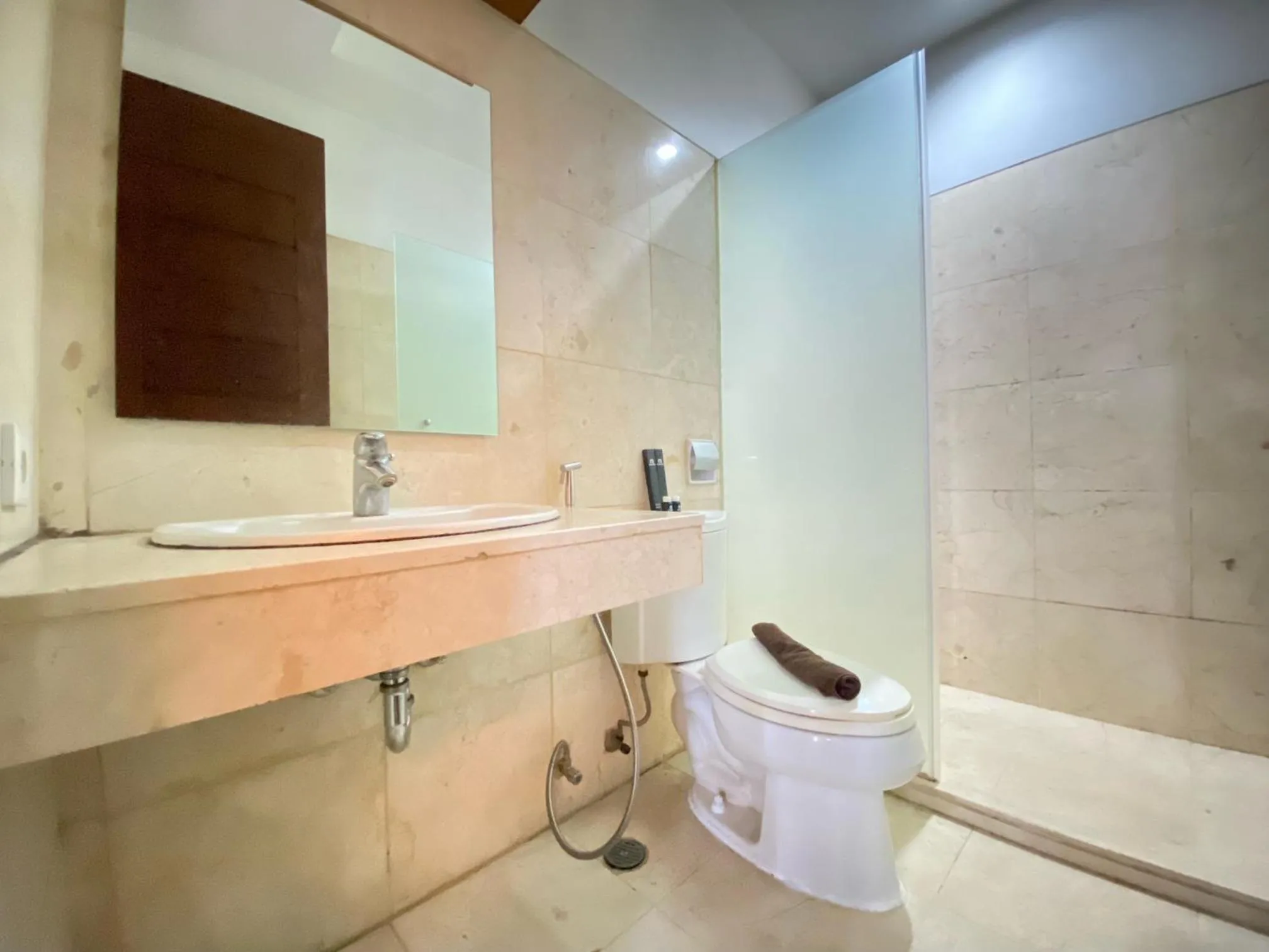 Bathroom in Spacious 2BR at Dago Butik Apartment By Travelio