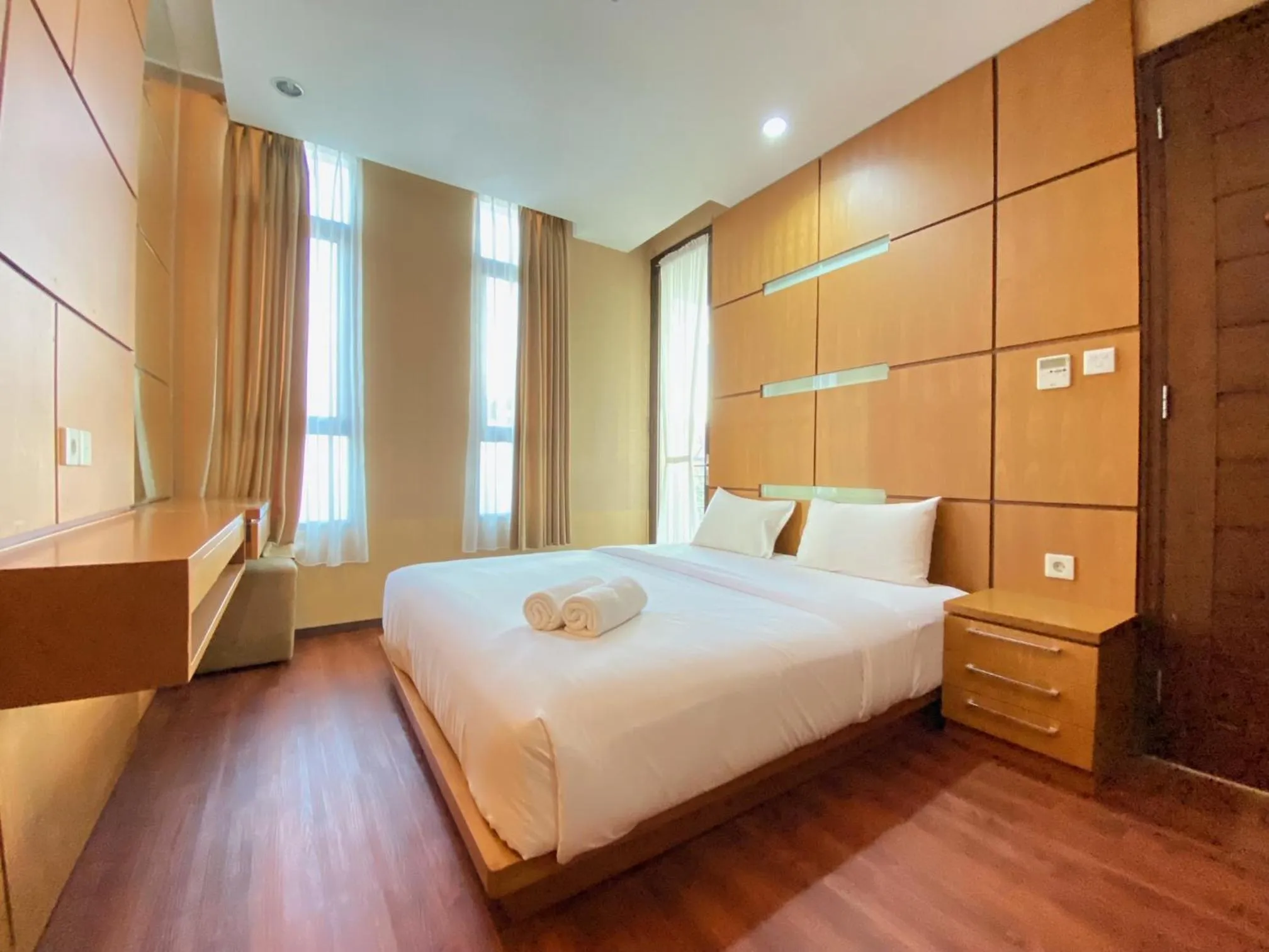 Bed in Spacious 2BR at Dago Butik Apartment By Travelio