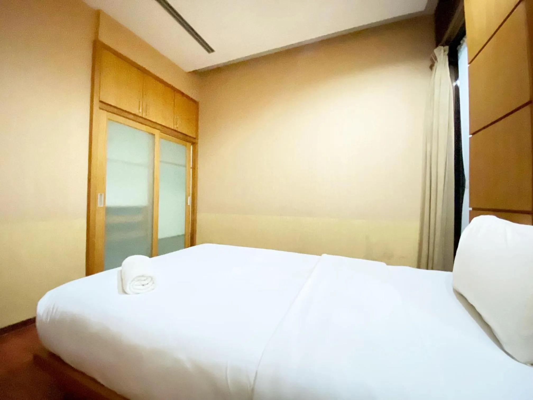 Bed in Spacious 2BR at Dago Butik Apartment By Travelio