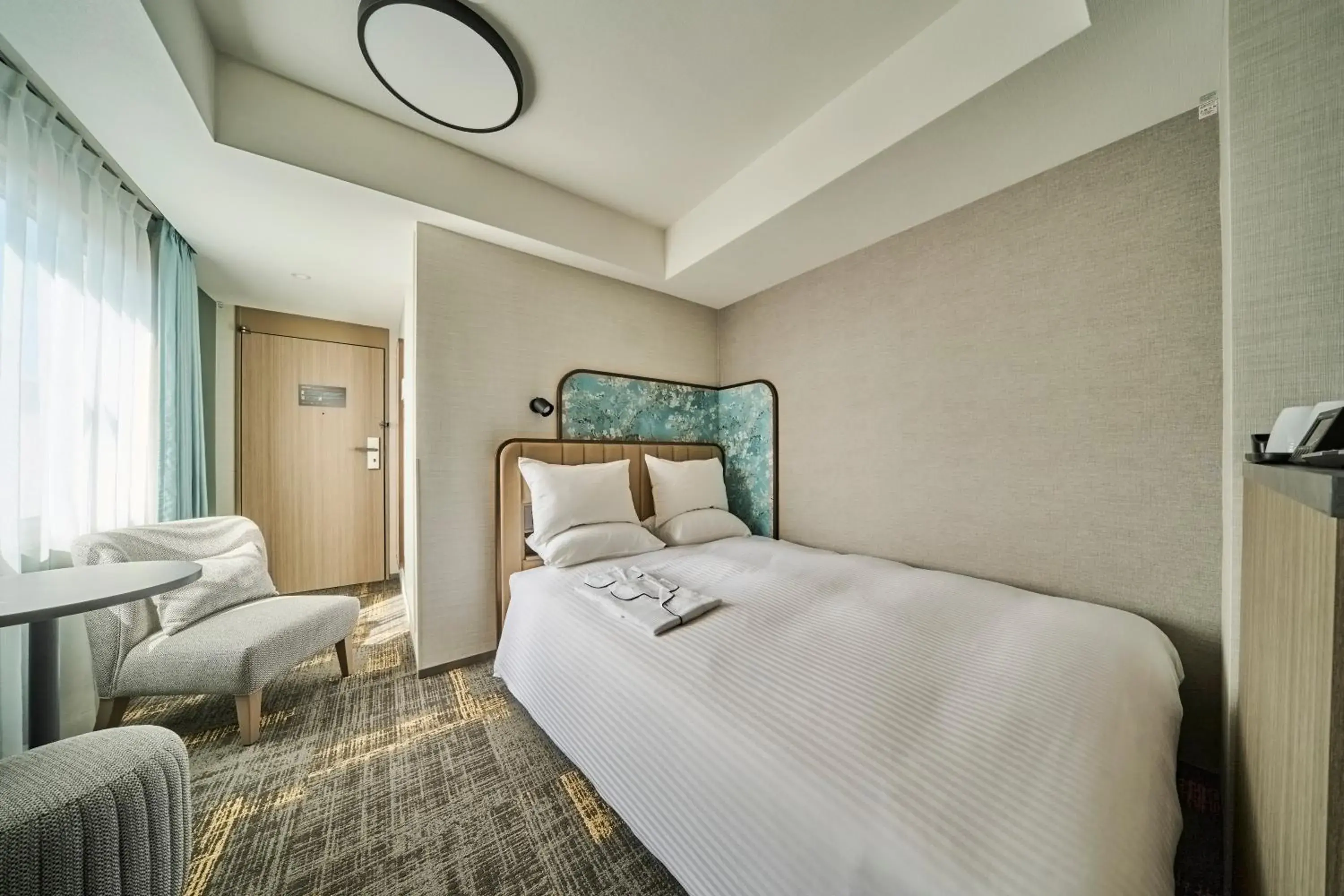 Bed in Hotel Flora Funabashi Bed in Hotel Flora Funabashi