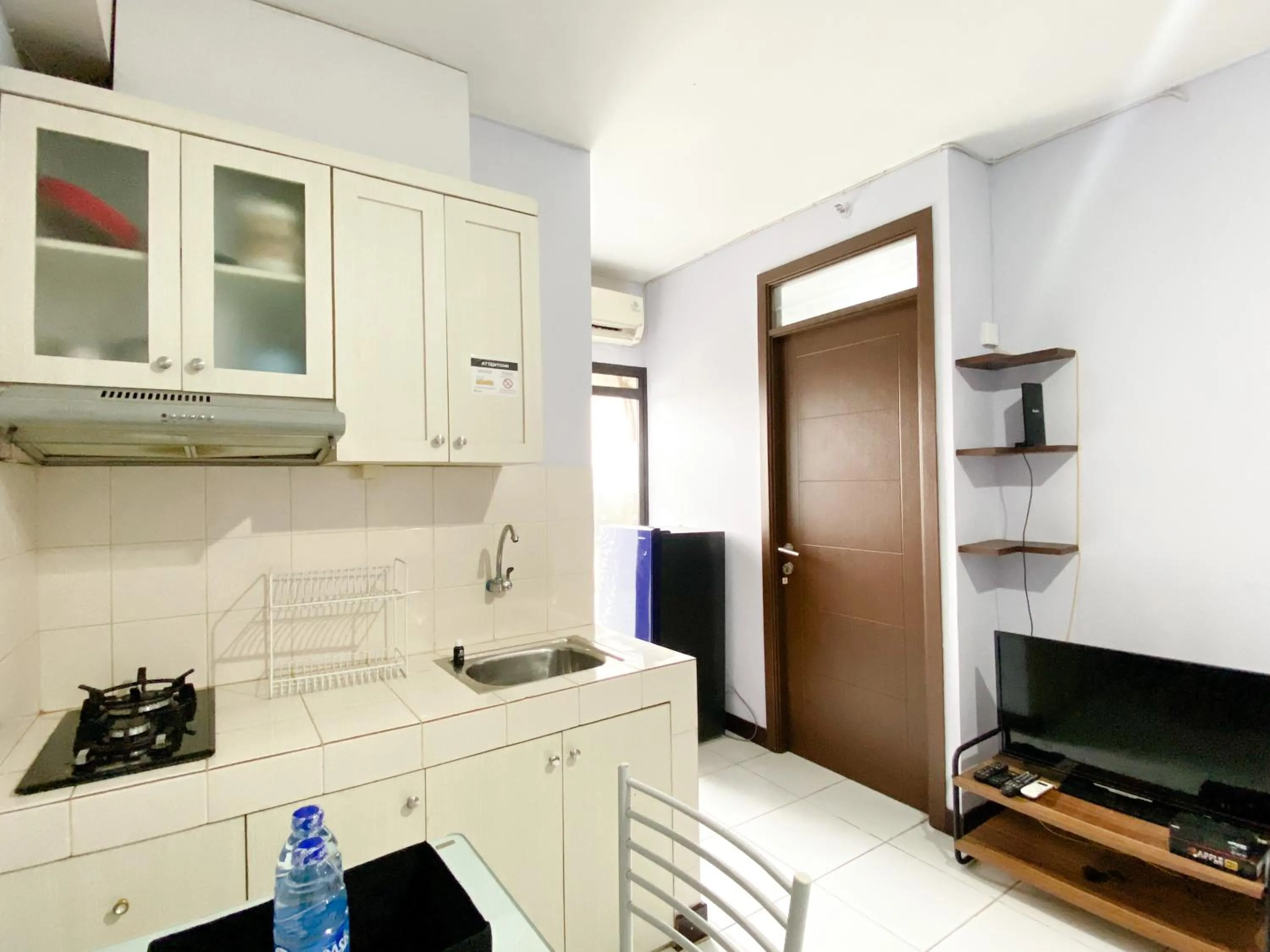 Homey and Cozy Living 2BR Lagoon Bekasi Town Square Apartment By Travelio