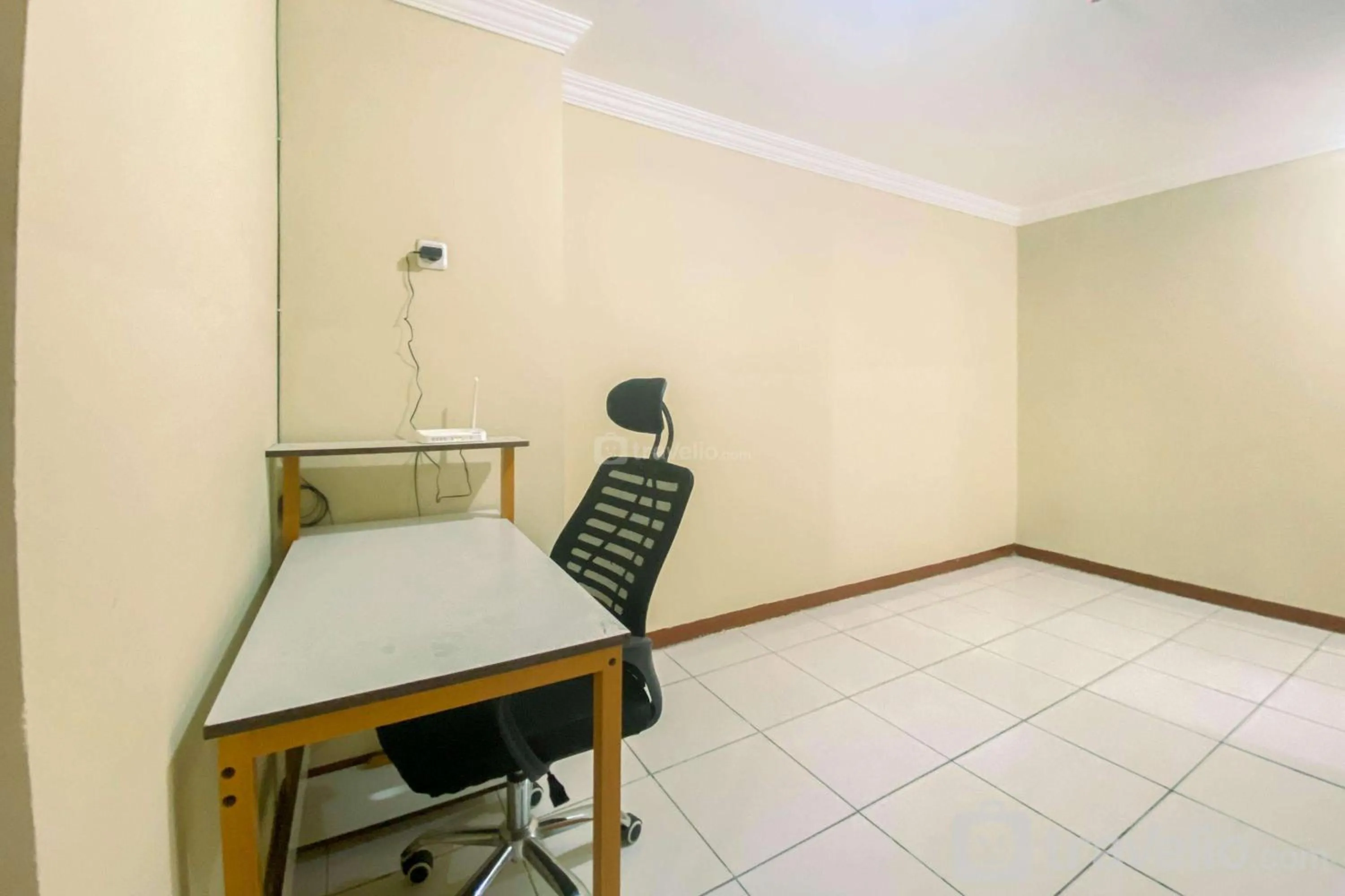 Bed in Luxury 2BR at Grand Palace Kemayoran Apartment By Travelio