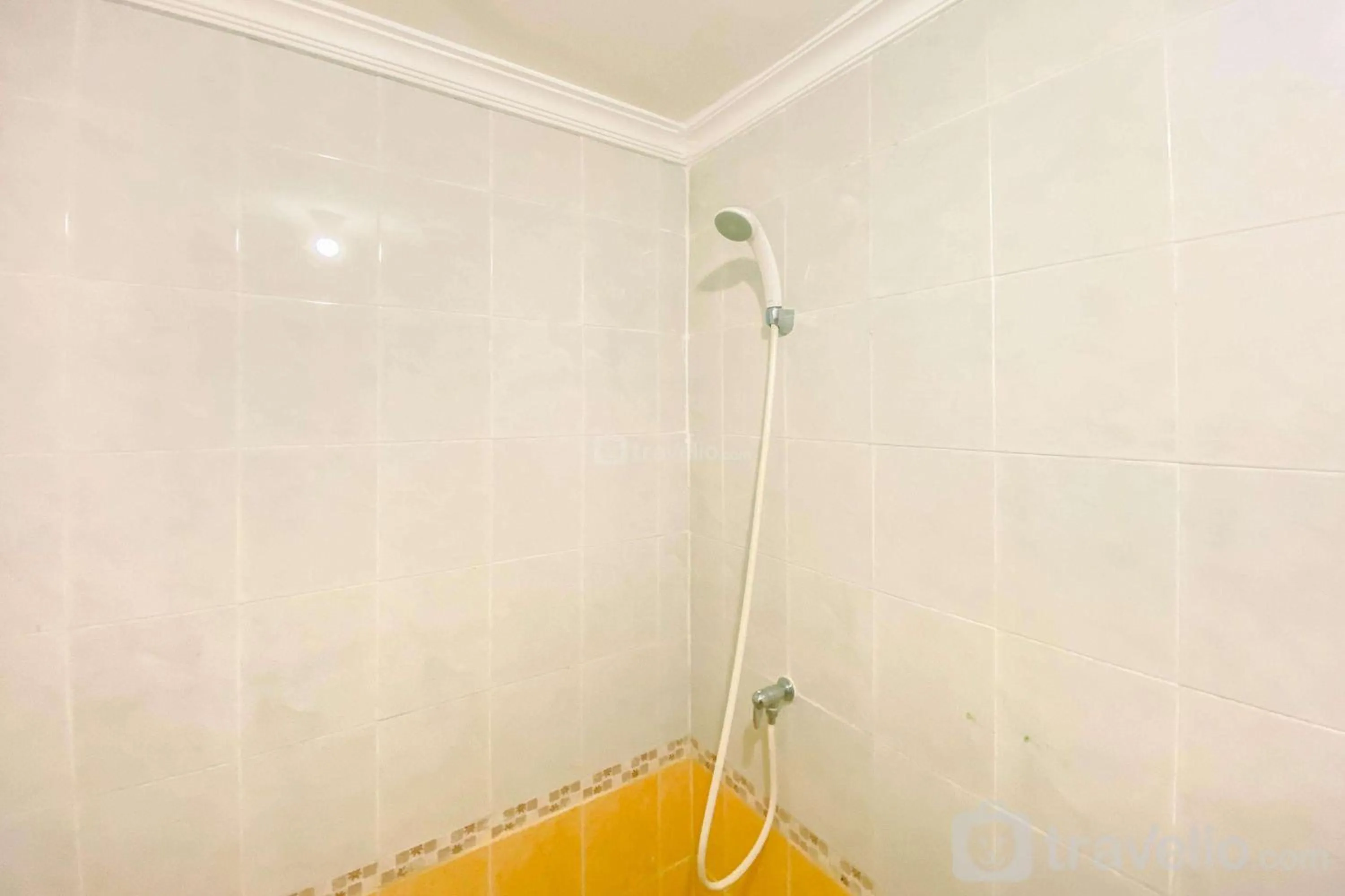 Bed in Luxury 2BR at Grand Palace Kemayoran Apartment By Travelio