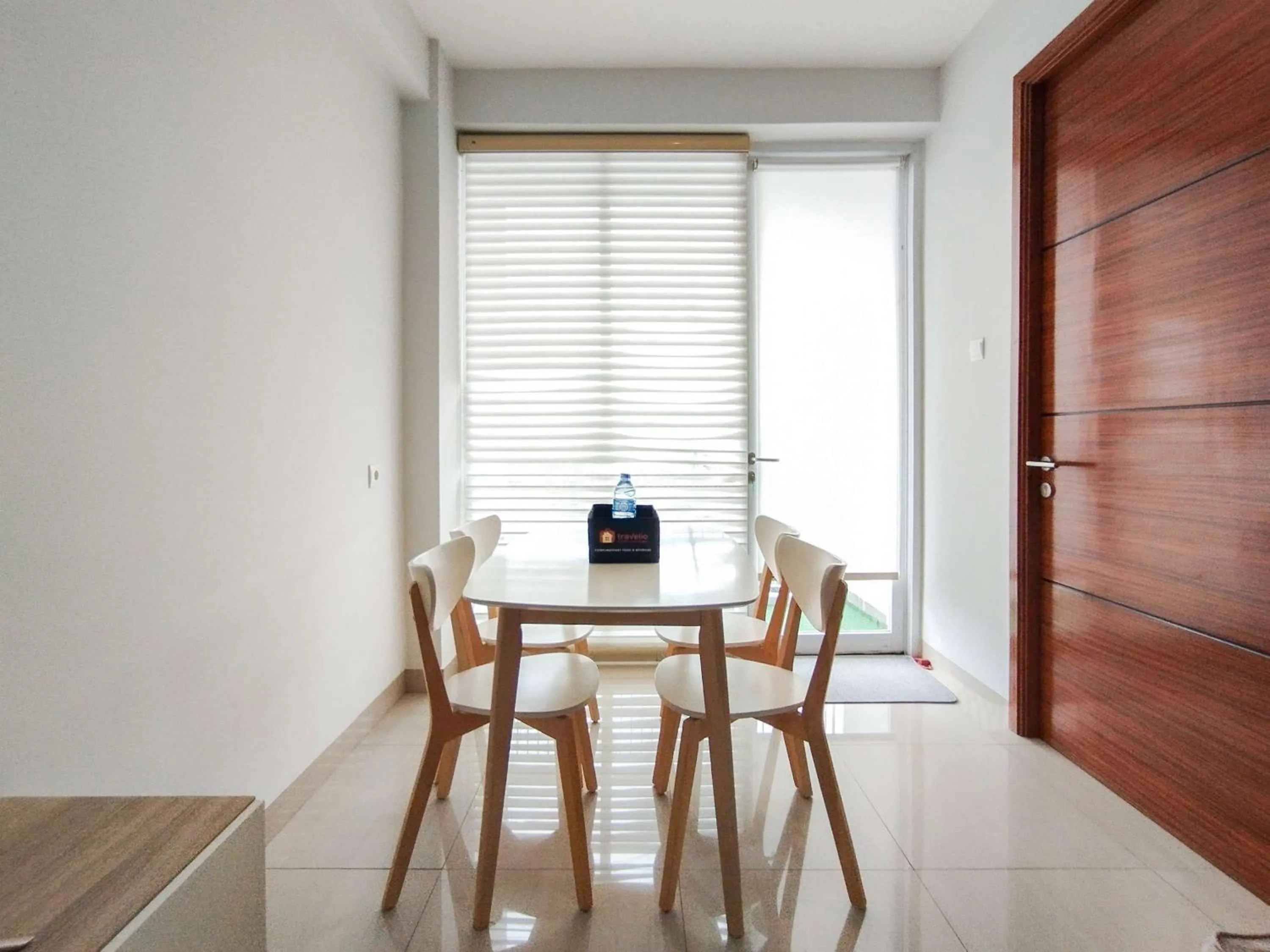 Bed in Tranquil Designed 2BR Apartment Dago Suites By Travelio