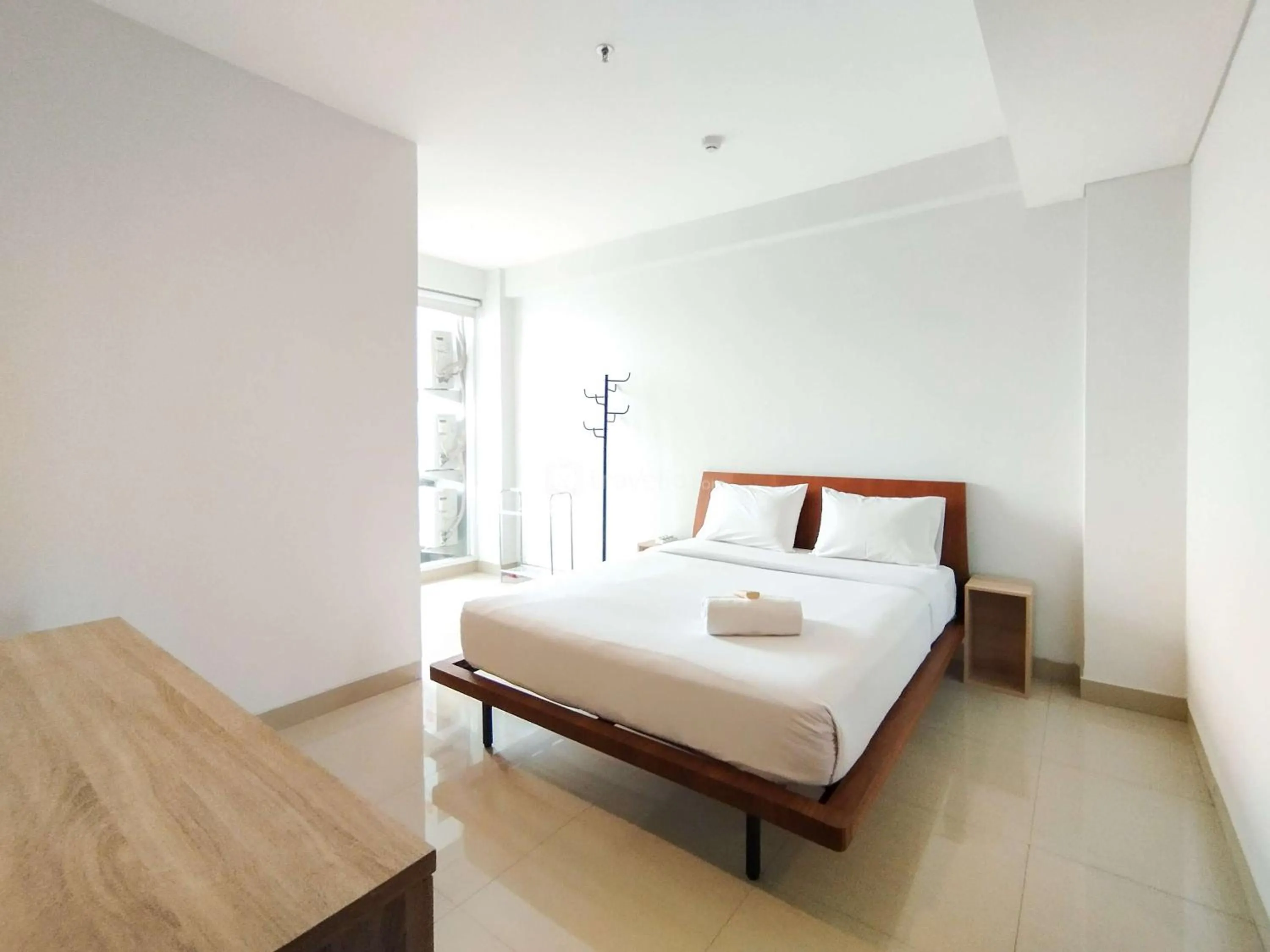 Bed in Tranquil Designed 2BR Apartment Dago Suites By Travelio