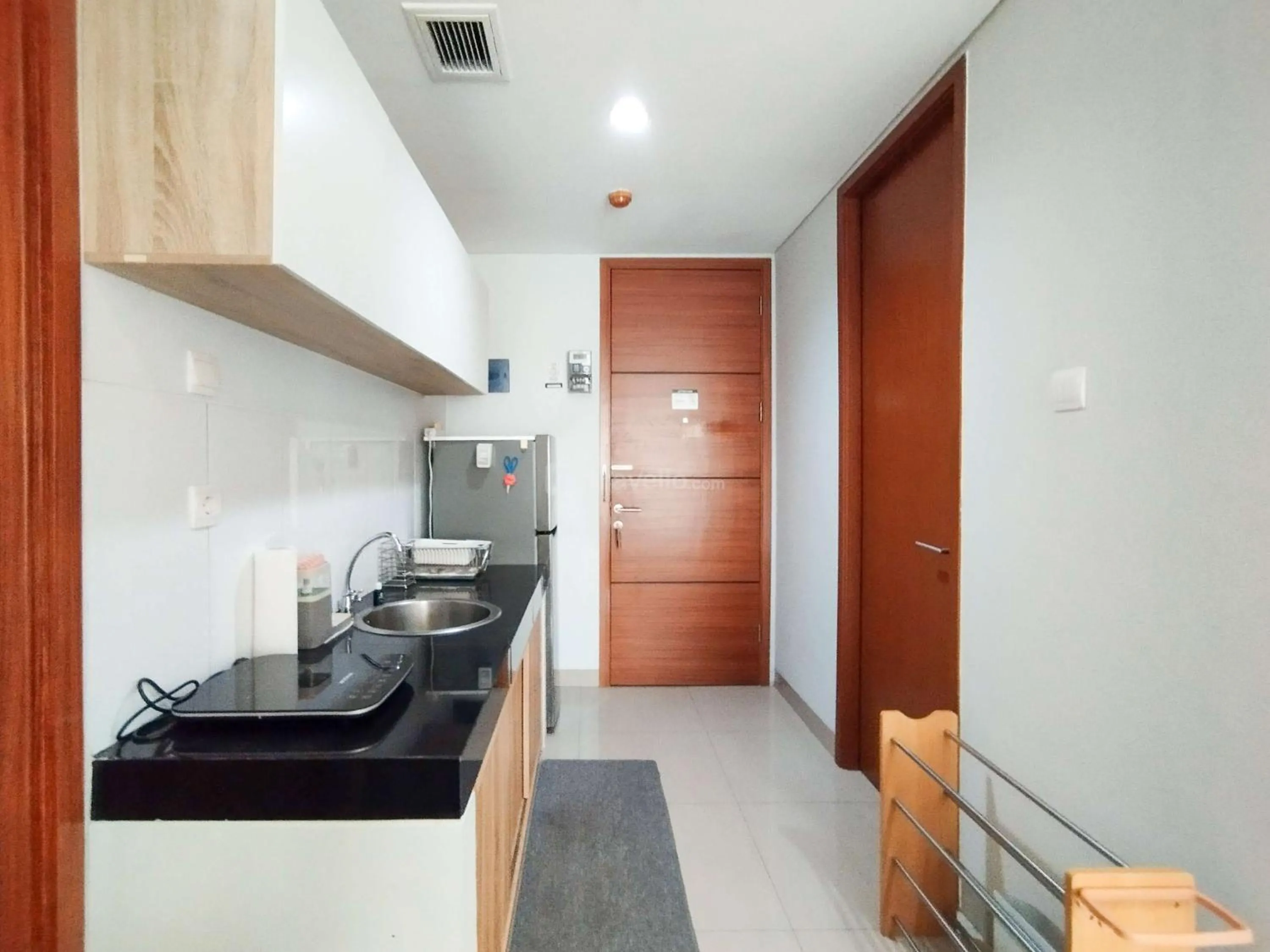 Bed in Tranquil Designed 2BR Apartment Dago Suites By Travelio