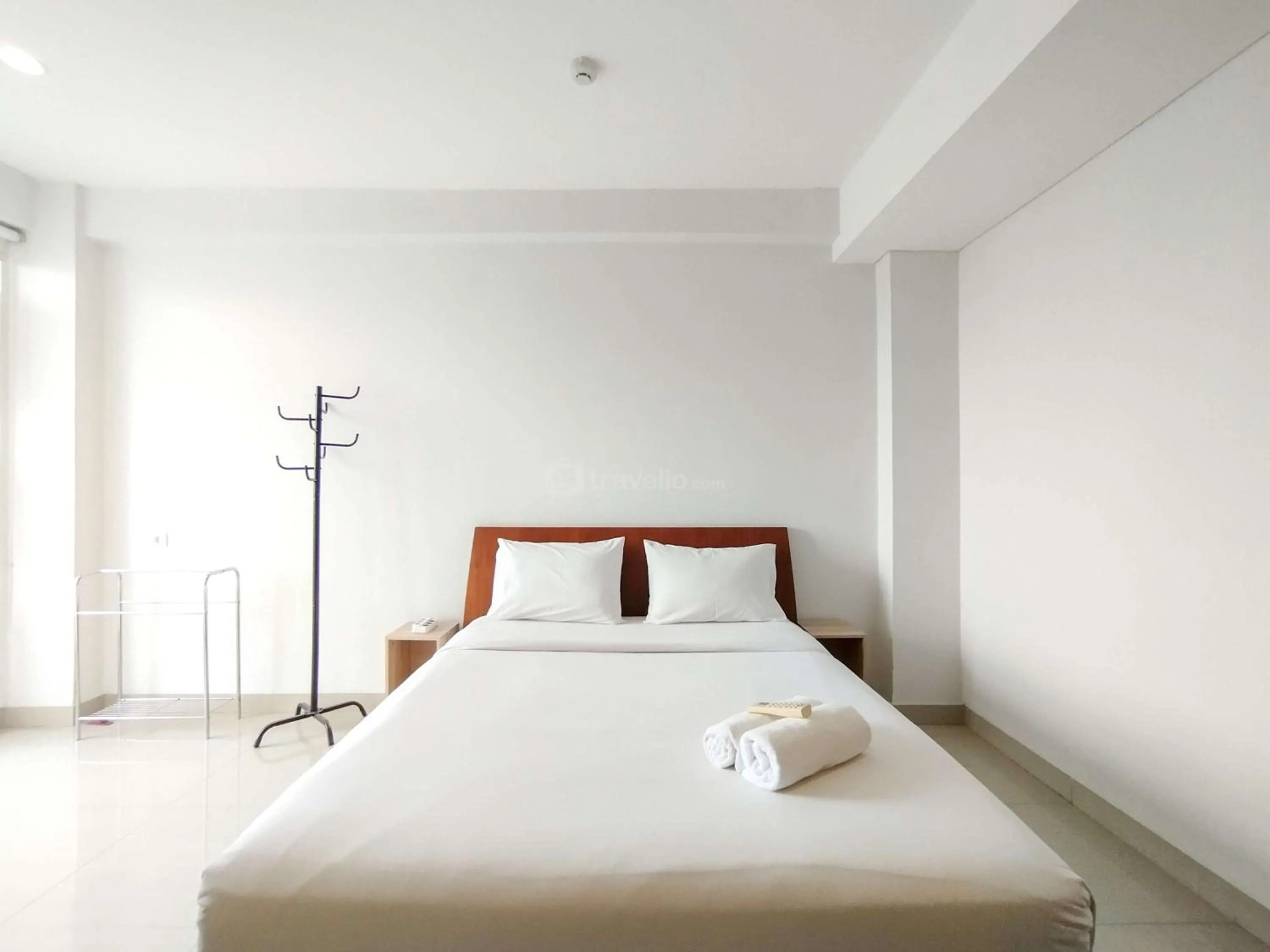 Bed in Tranquil Designed 2BR Apartment Dago Suites By Travelio