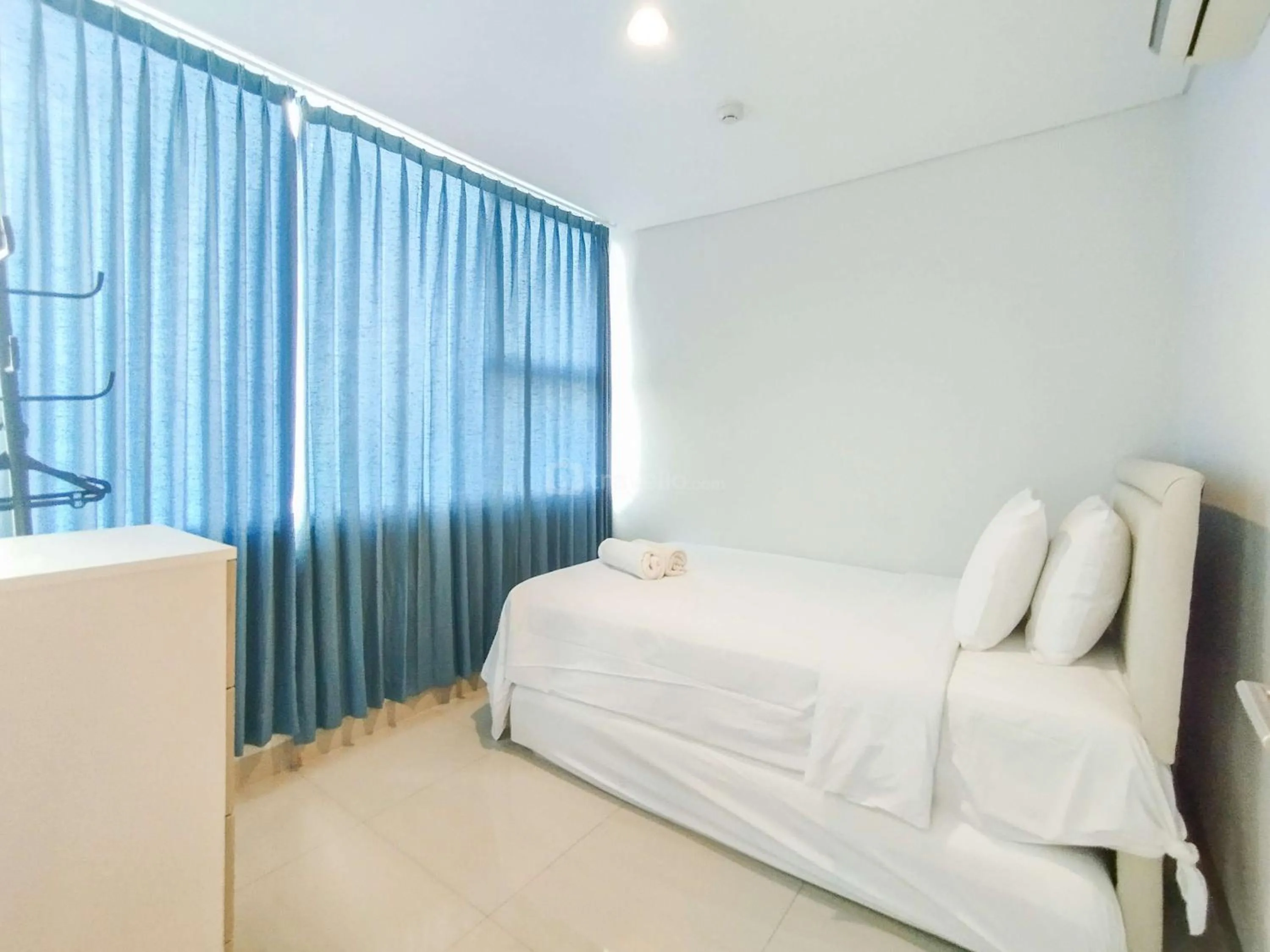 Bed in Tranquil Designed 2BR Apartment Dago Suites By Travelio