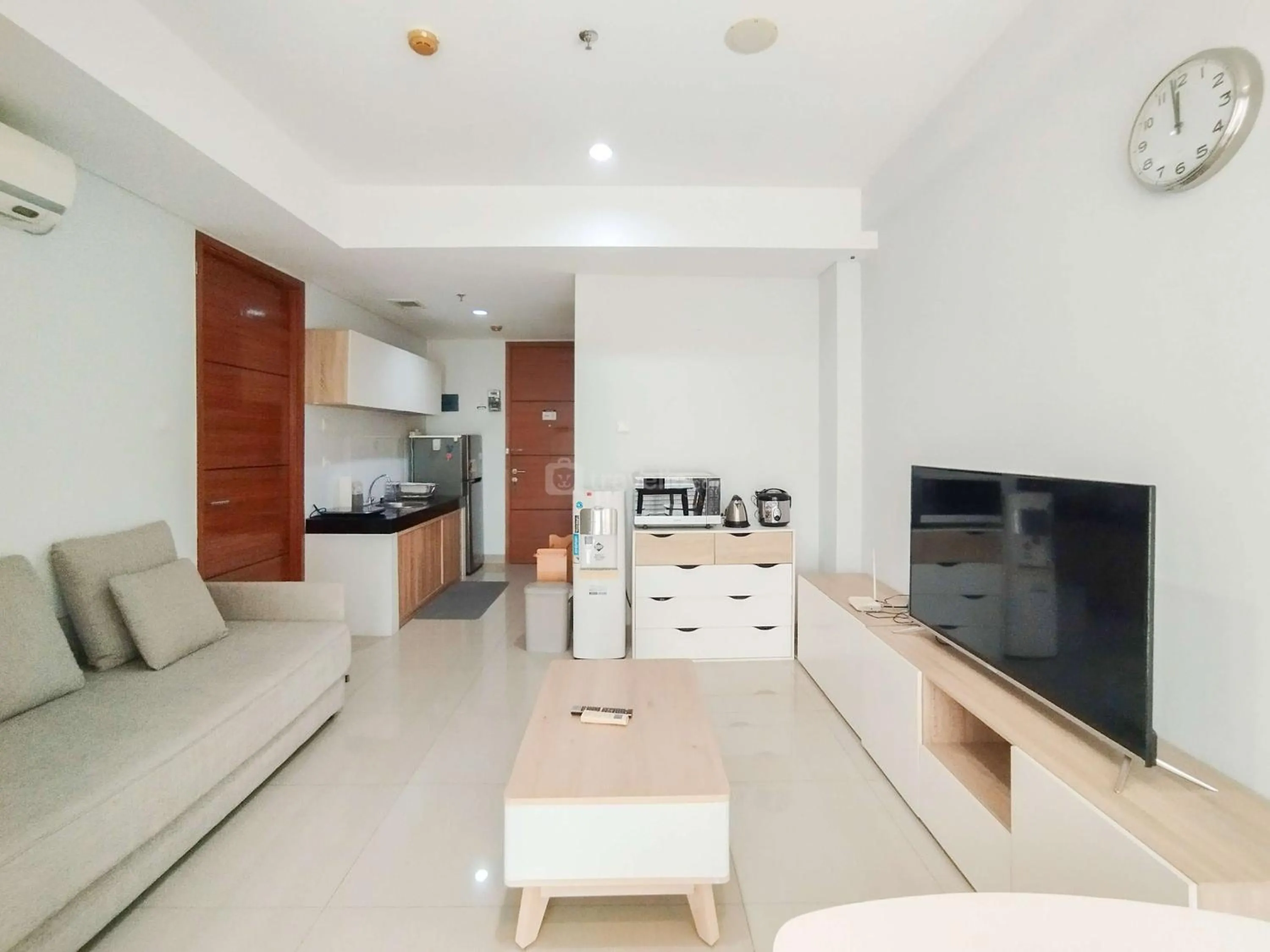 Bed in Tranquil Designed 2BR Apartment Dago Suites By Travelio