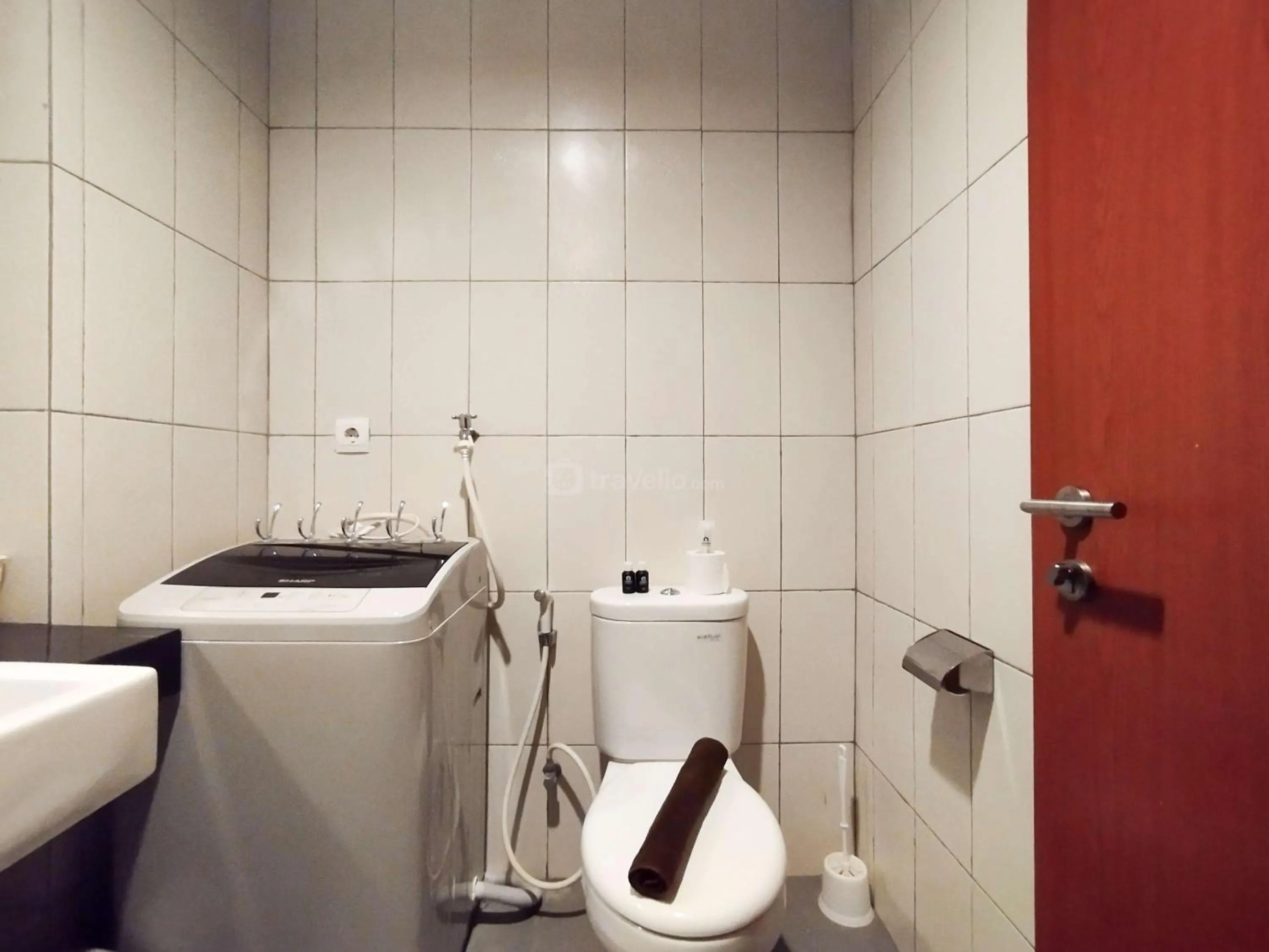 Bed in Tranquil Designed 2BR Apartment Dago Suites By Travelio