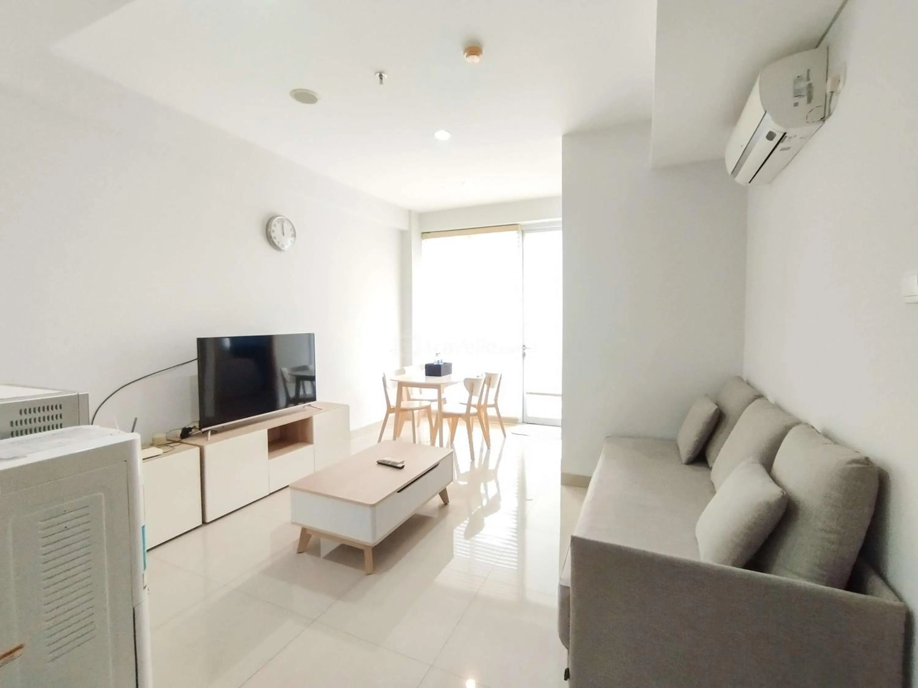 Bed in Tranquil Designed 2BR Apartment Dago Suites By Travelio