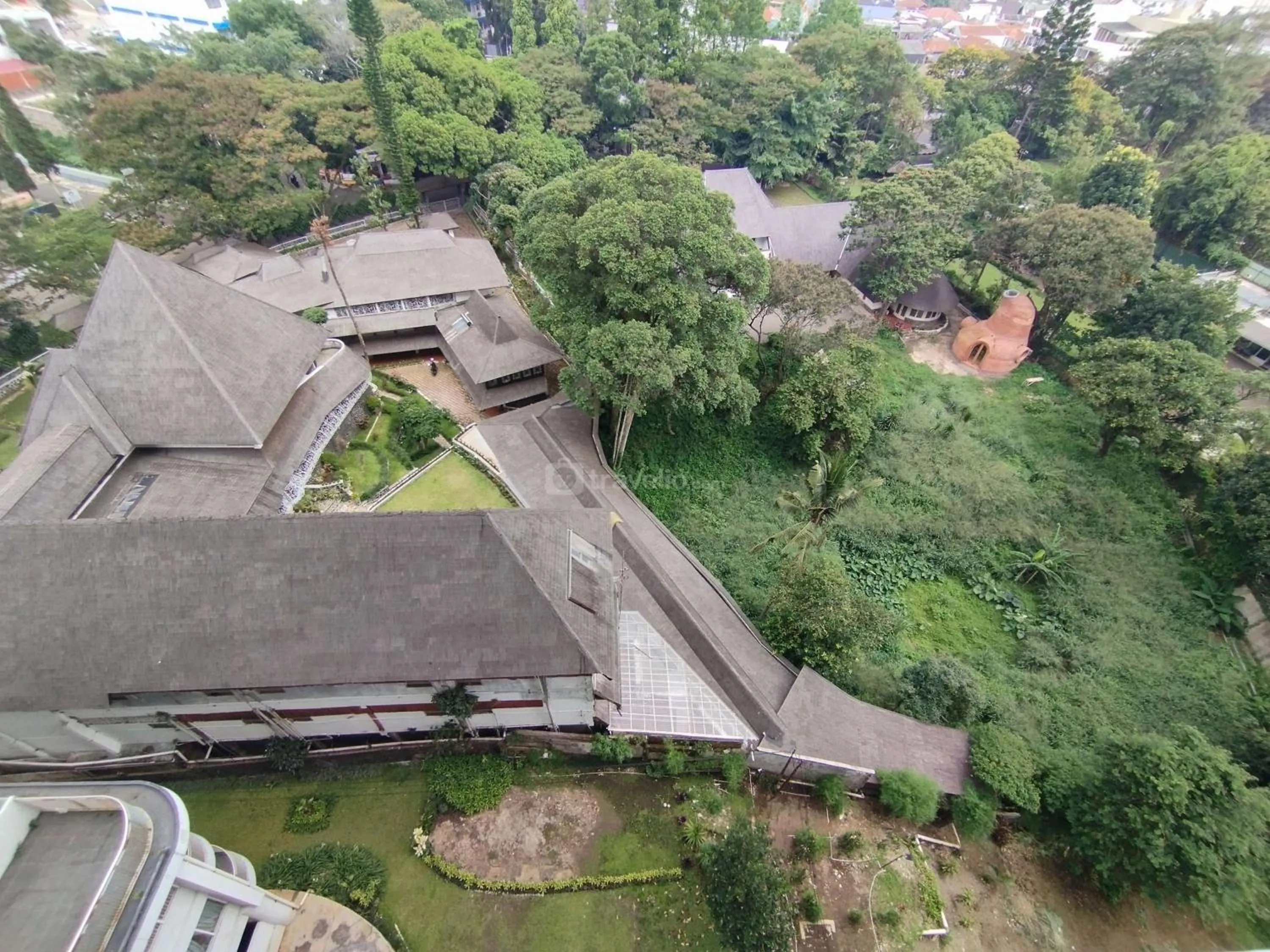 Bed in Tranquil Designed 2BR Apartment Dago Suites By Travelio