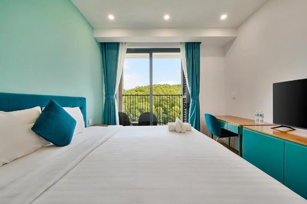 Bed in Elyday Apartment Hillside Phu Quoc - Sea & Firework view