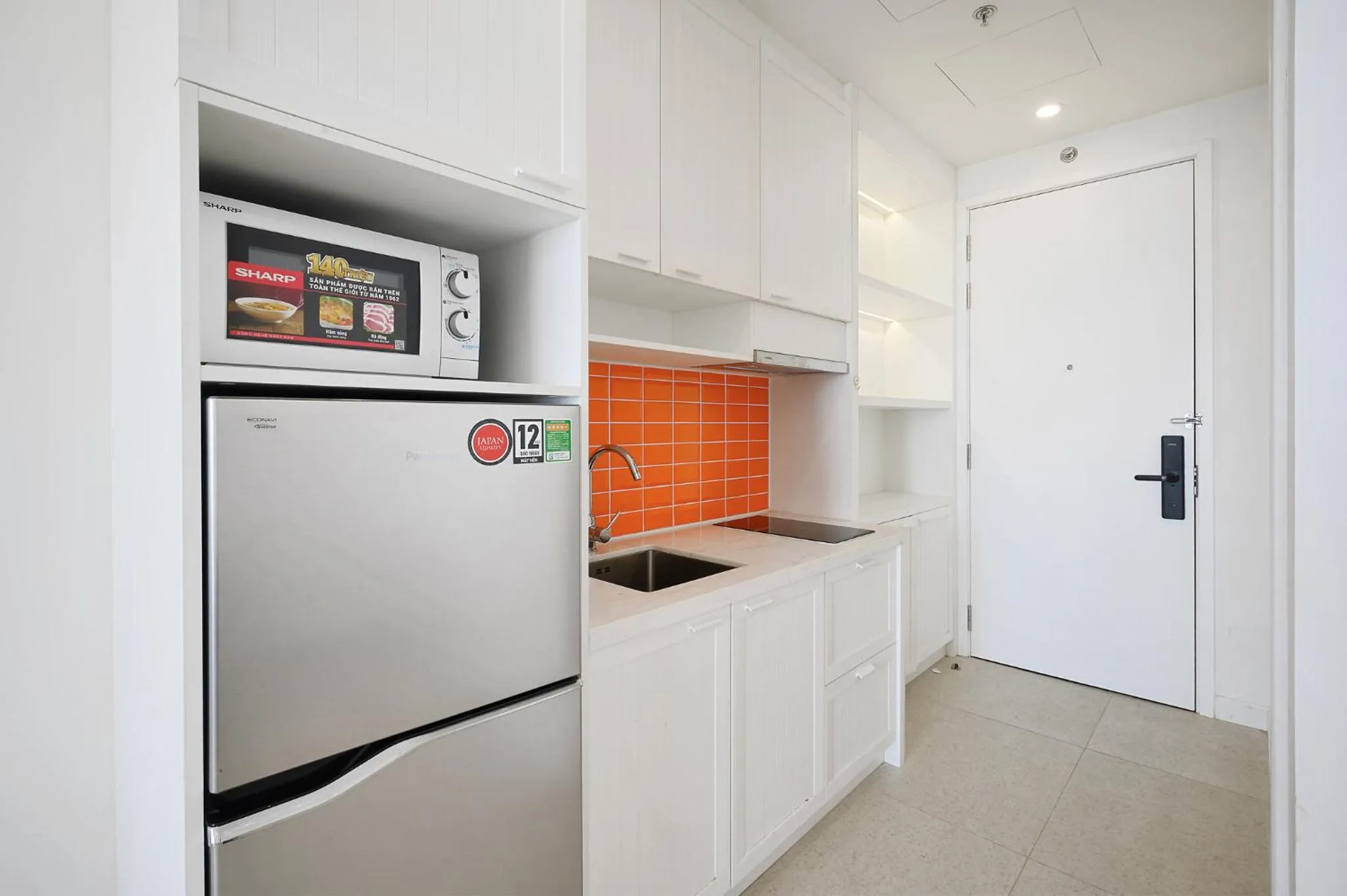 Kitchen or kitchenette in Elyday Apartment Hillside Phu Quoc - Sea & Firework view