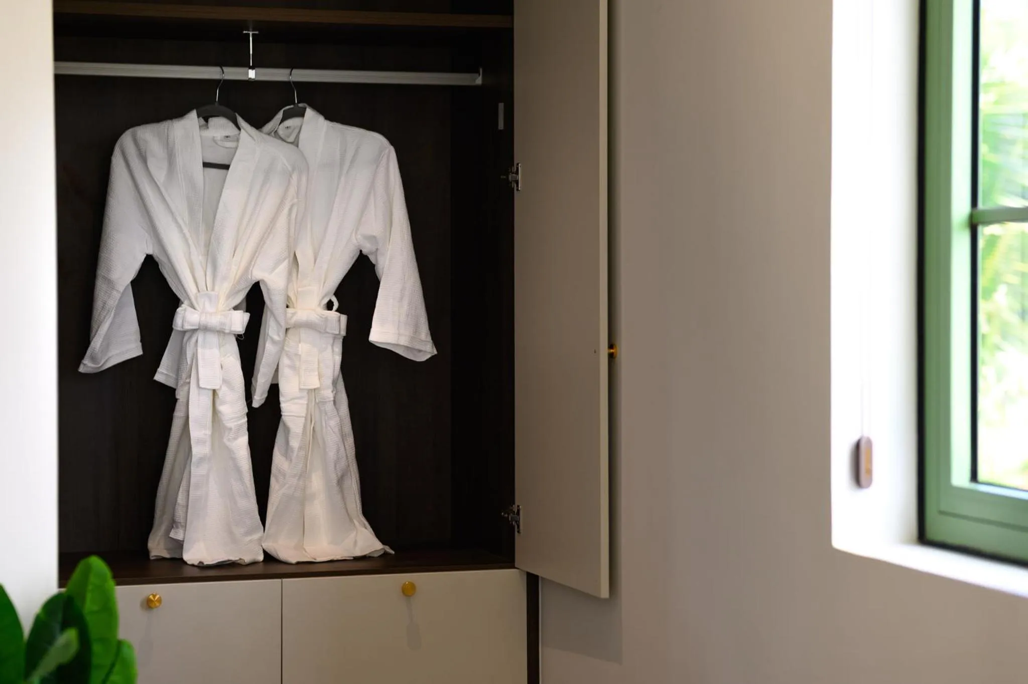 wardrobe in Elyday Apartment Hillside Phu Quoc - Sea & Firework view