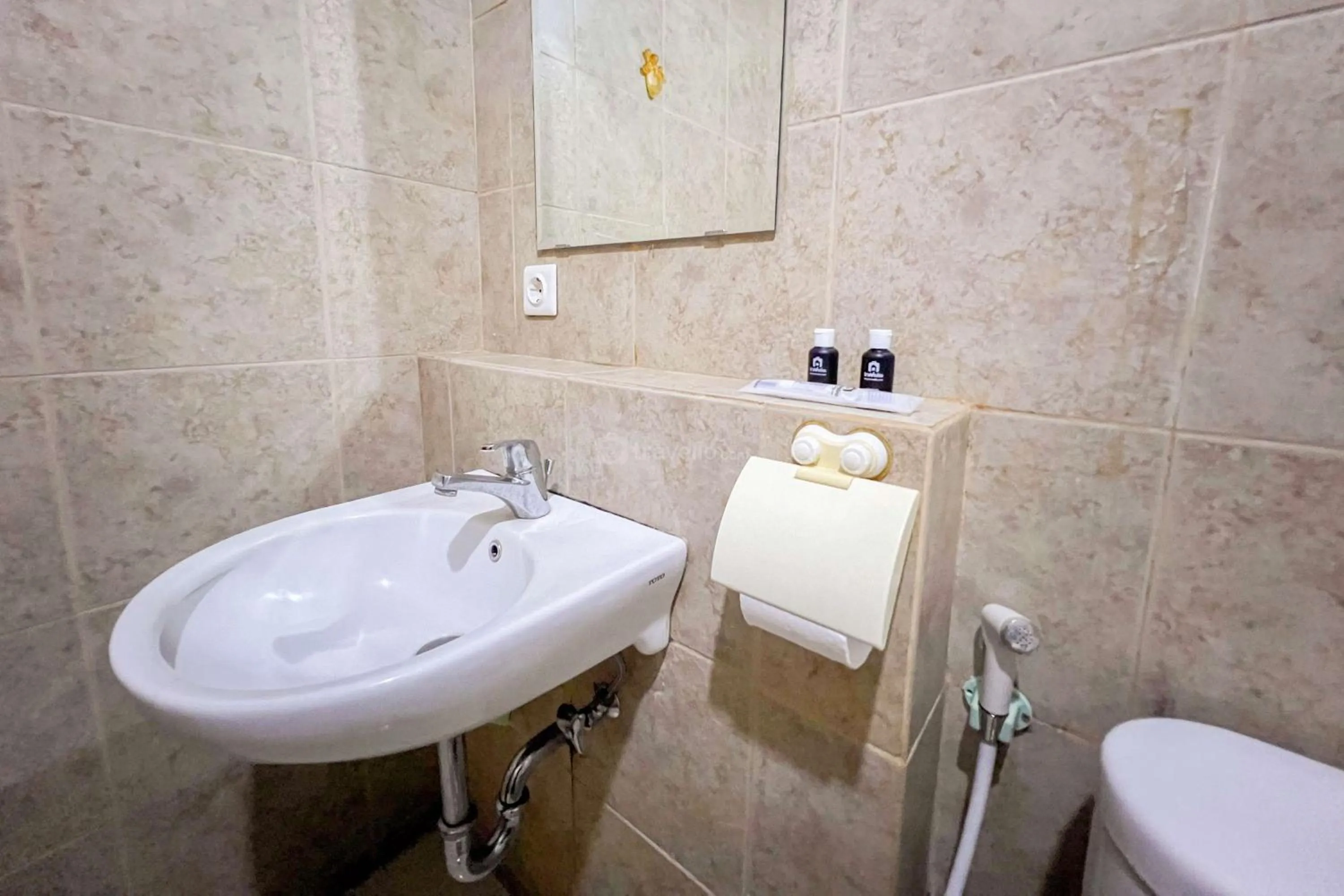 Bathroom in Cozy 1BR at Marbella Suites Dago Pakar Bandung Apartment By Travelio