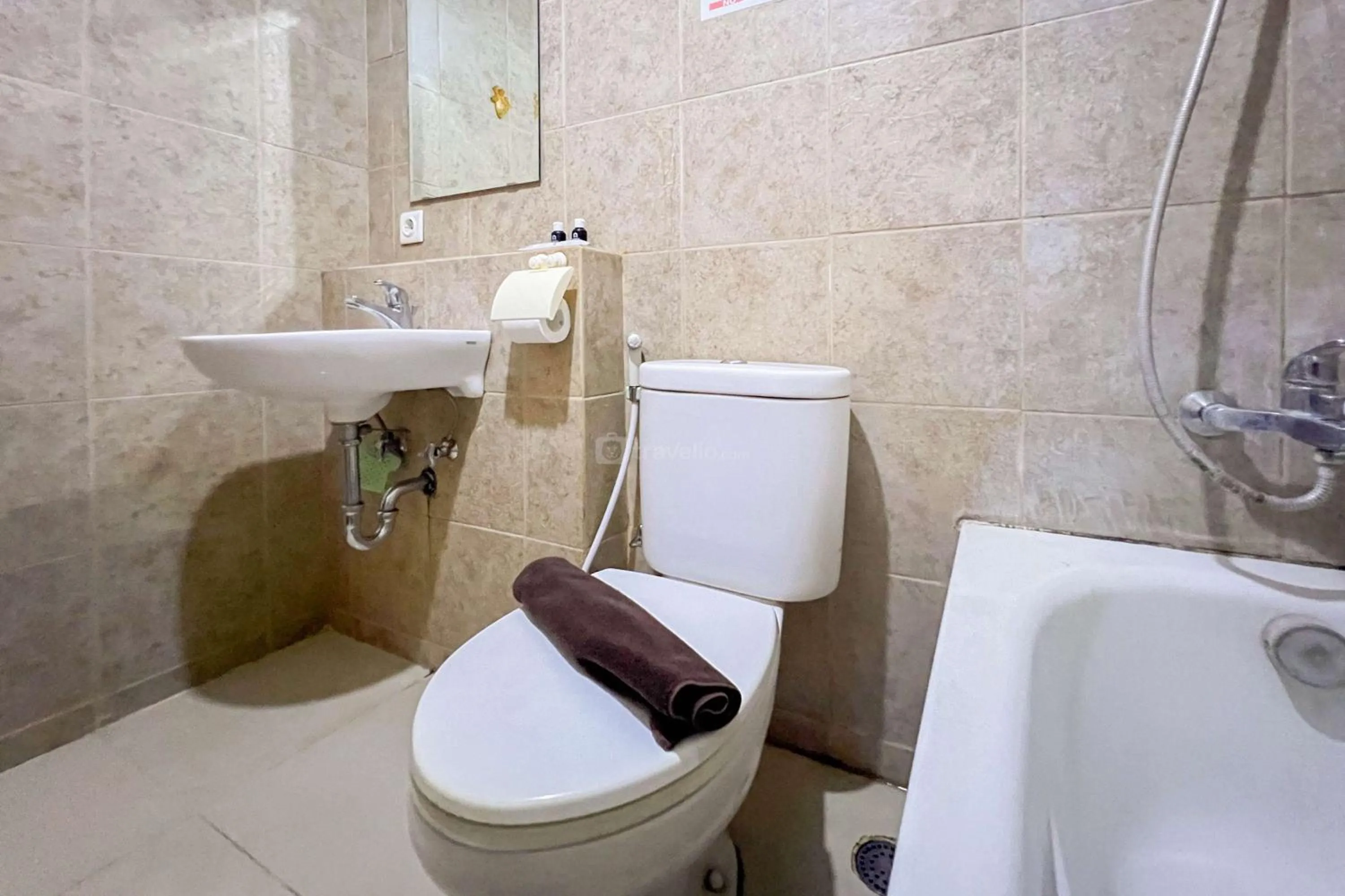 Bed in Cozy 1BR at Marbella Suites Dago Pakar Bandung Apartment By Travelio