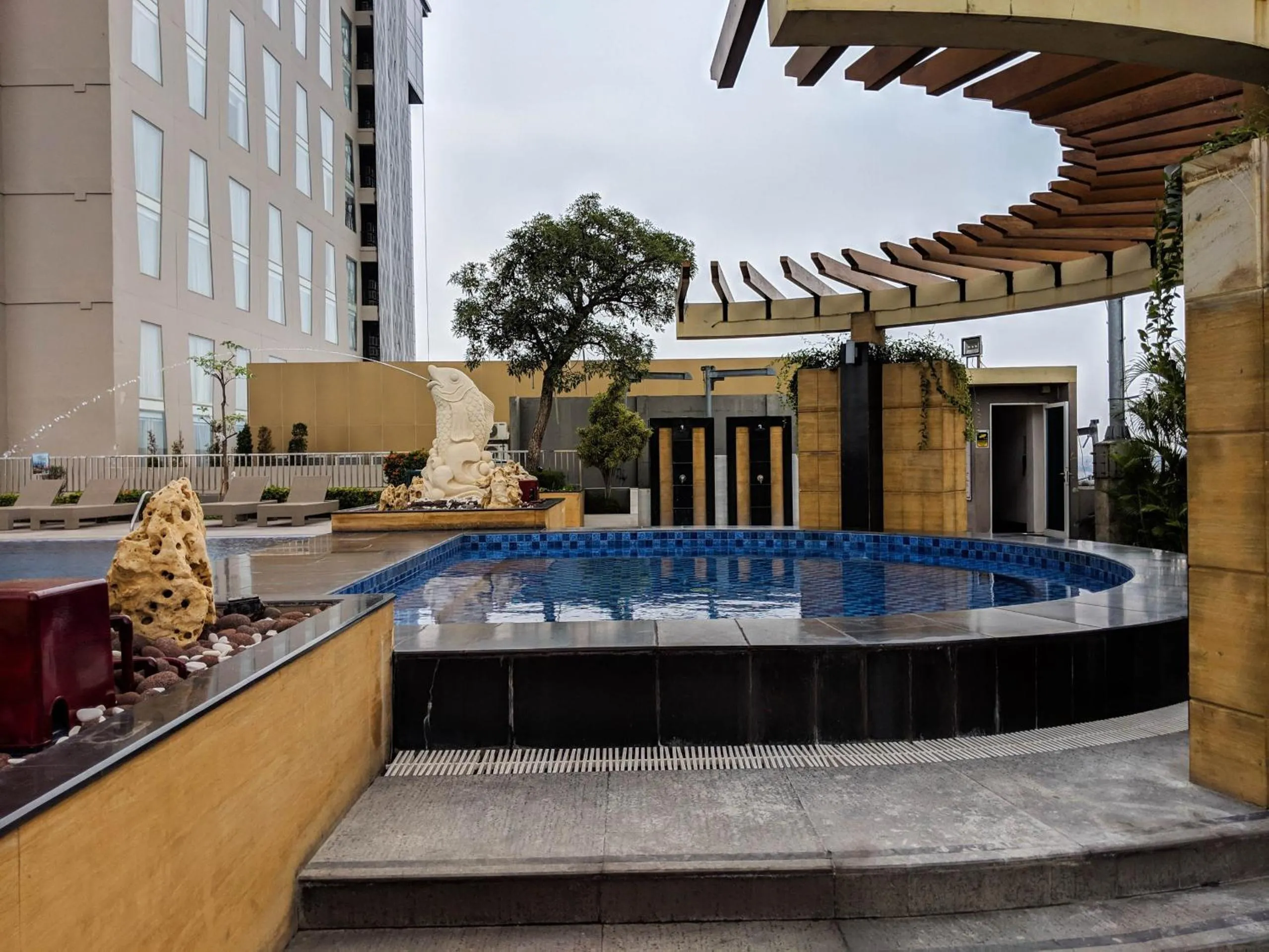 Property building in Strategic and Comfy 2BR Apartment at Trillium Residence By Travelio