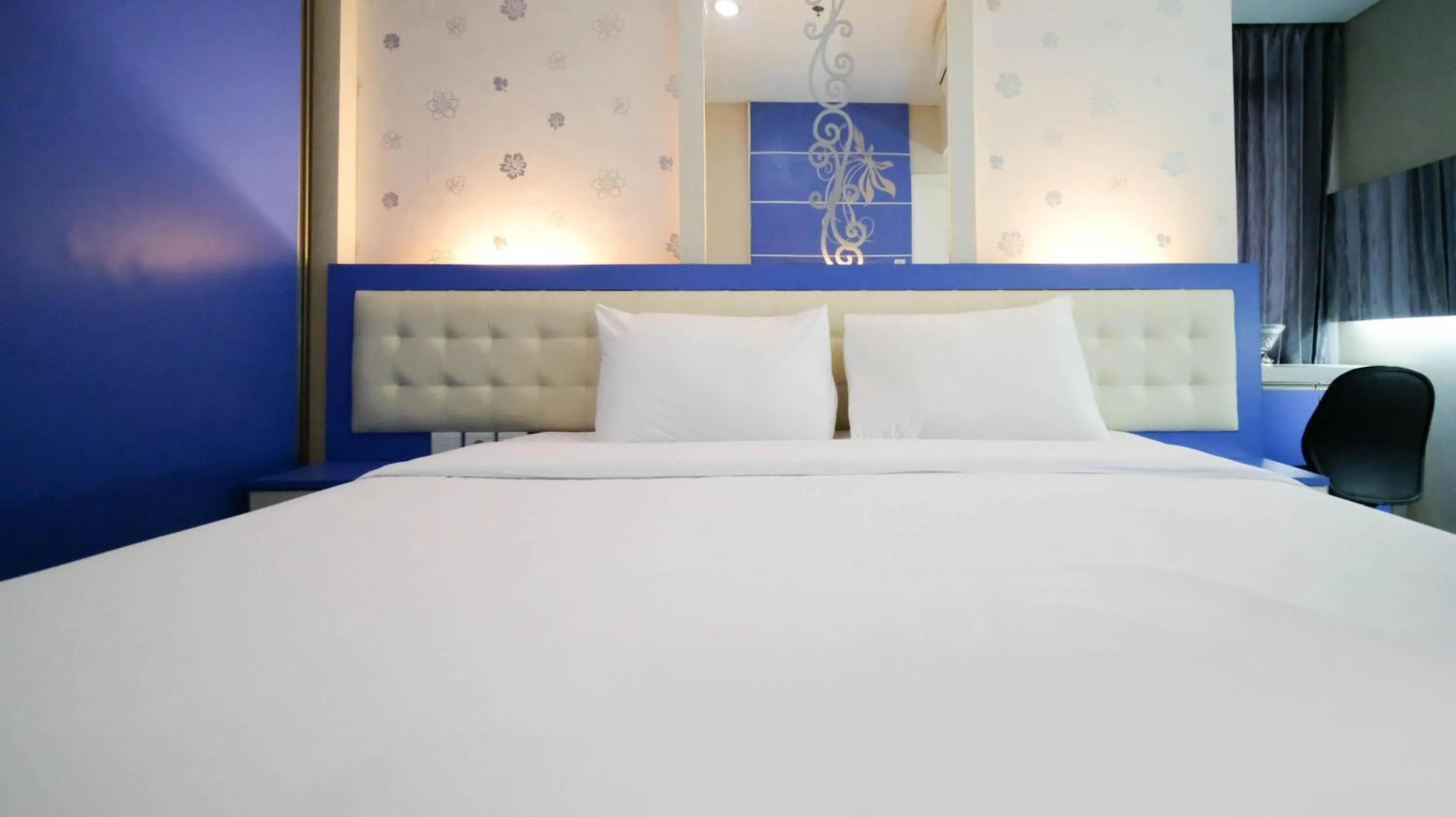 Bed in Strategic and Comfy 2BR Apartment at Trillium Residence By Travelio