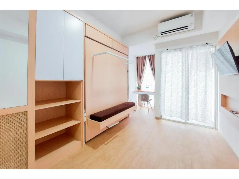 Minimalist Studio Room near Campus at Pacific Garden Alam Sutera Apartment By Travelio