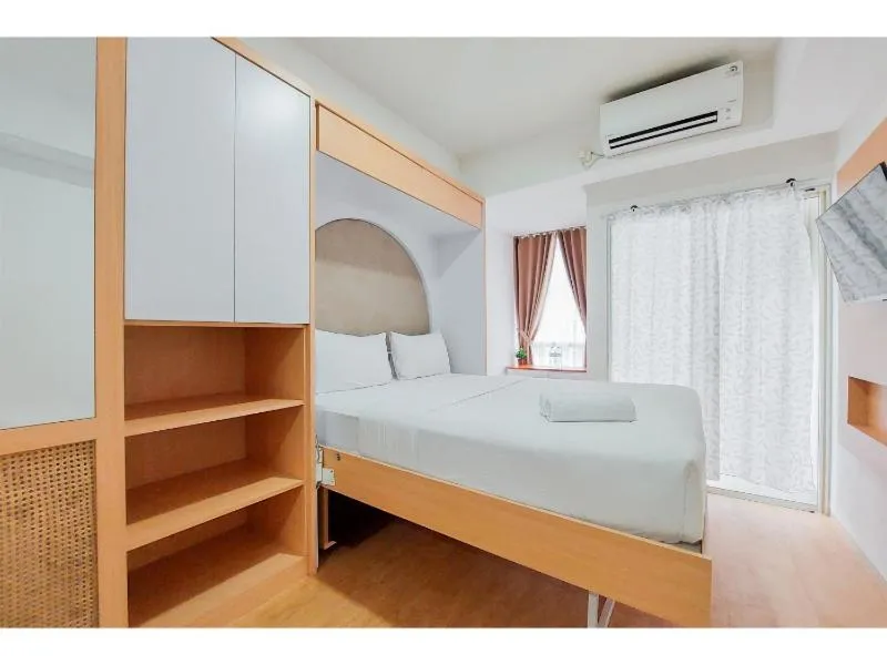 Minimalist Studio Room near Campus at Pacific Garden Alam Sutera Apartment By Travelio