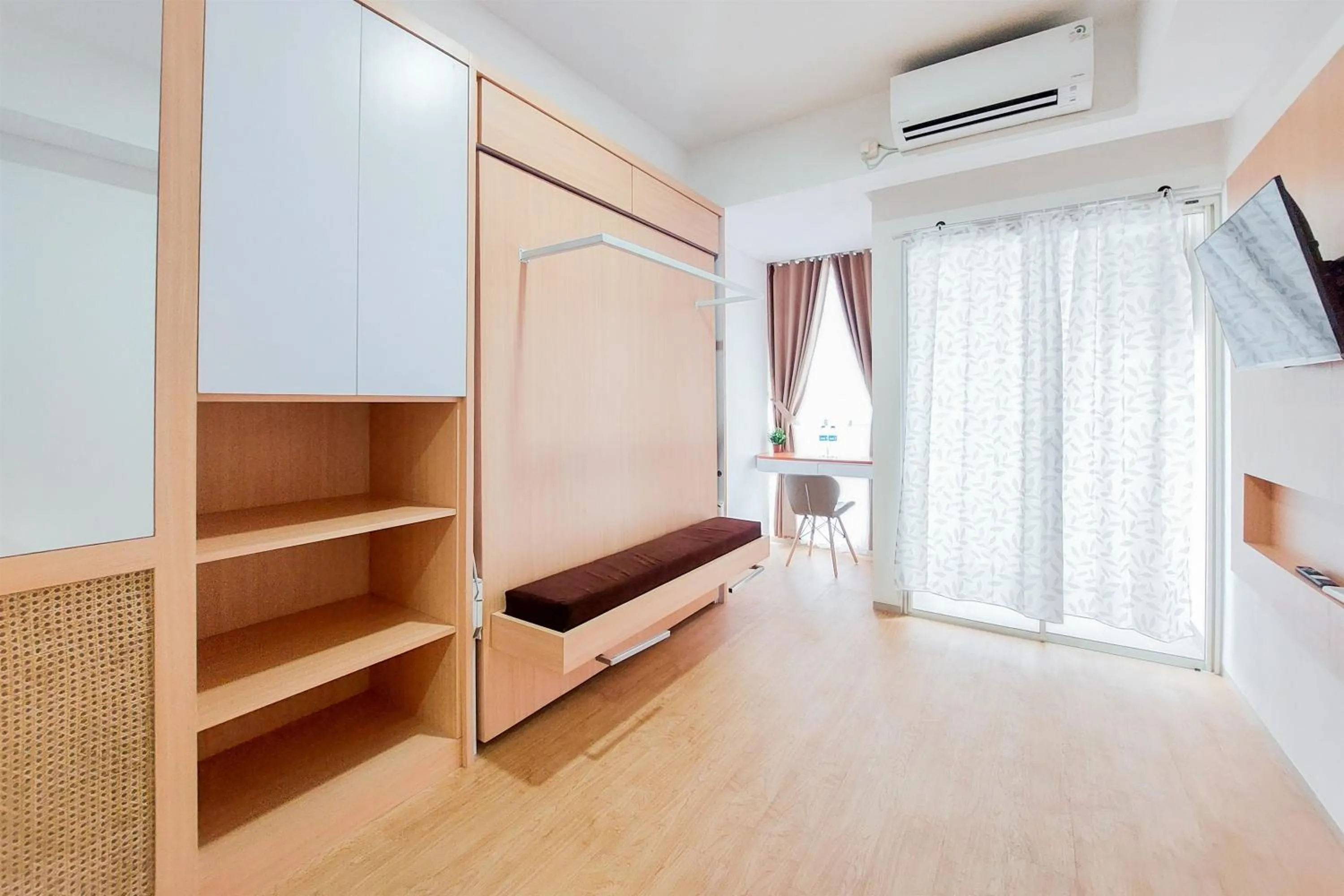 Minimalist Studio Room near Campus at Pacific Garden Alam Sutera Apartment By Travelio