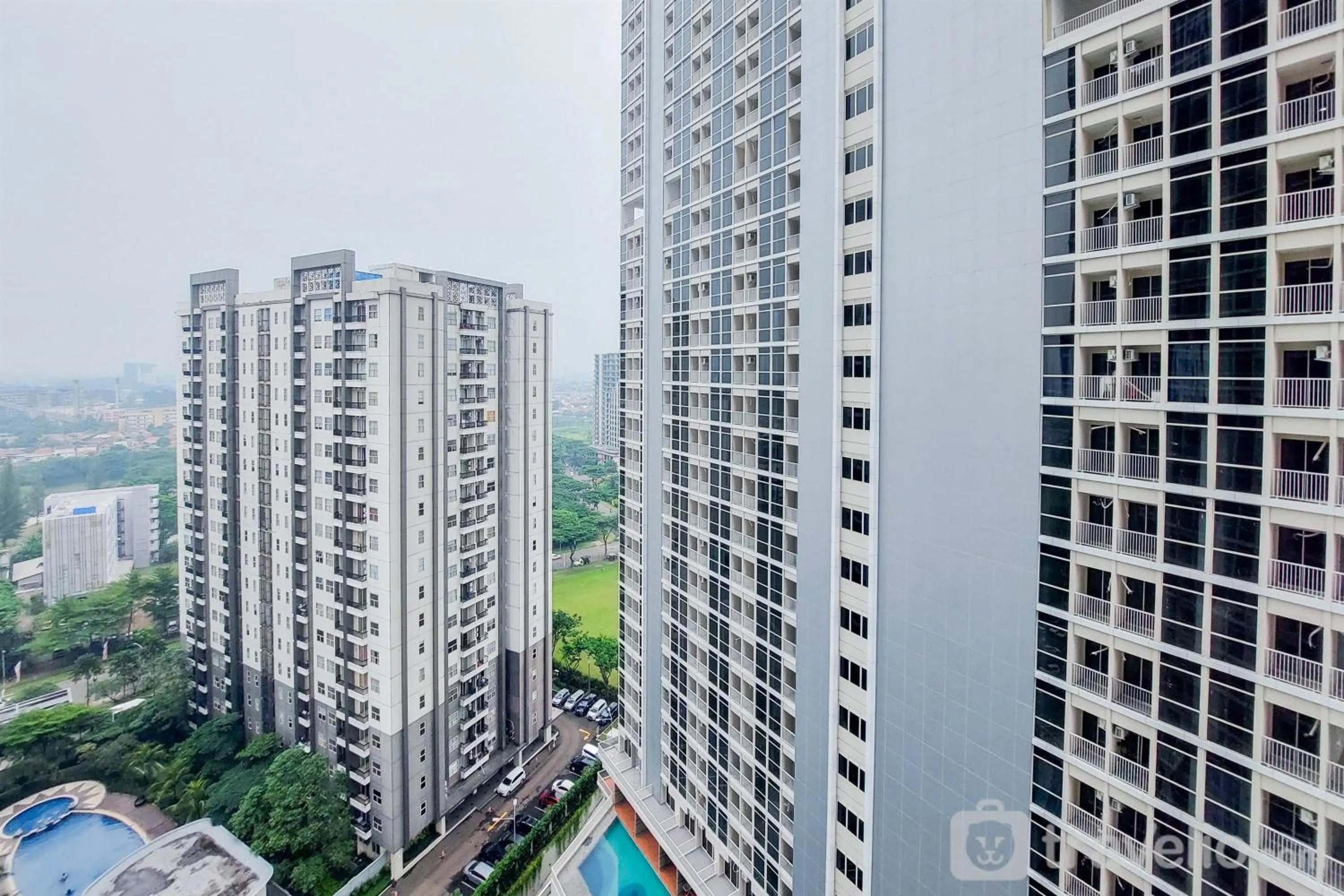 Property building in Minimalist Studio Room near Campus at Pacific Garden Alam Sutera Apartment By Travelio