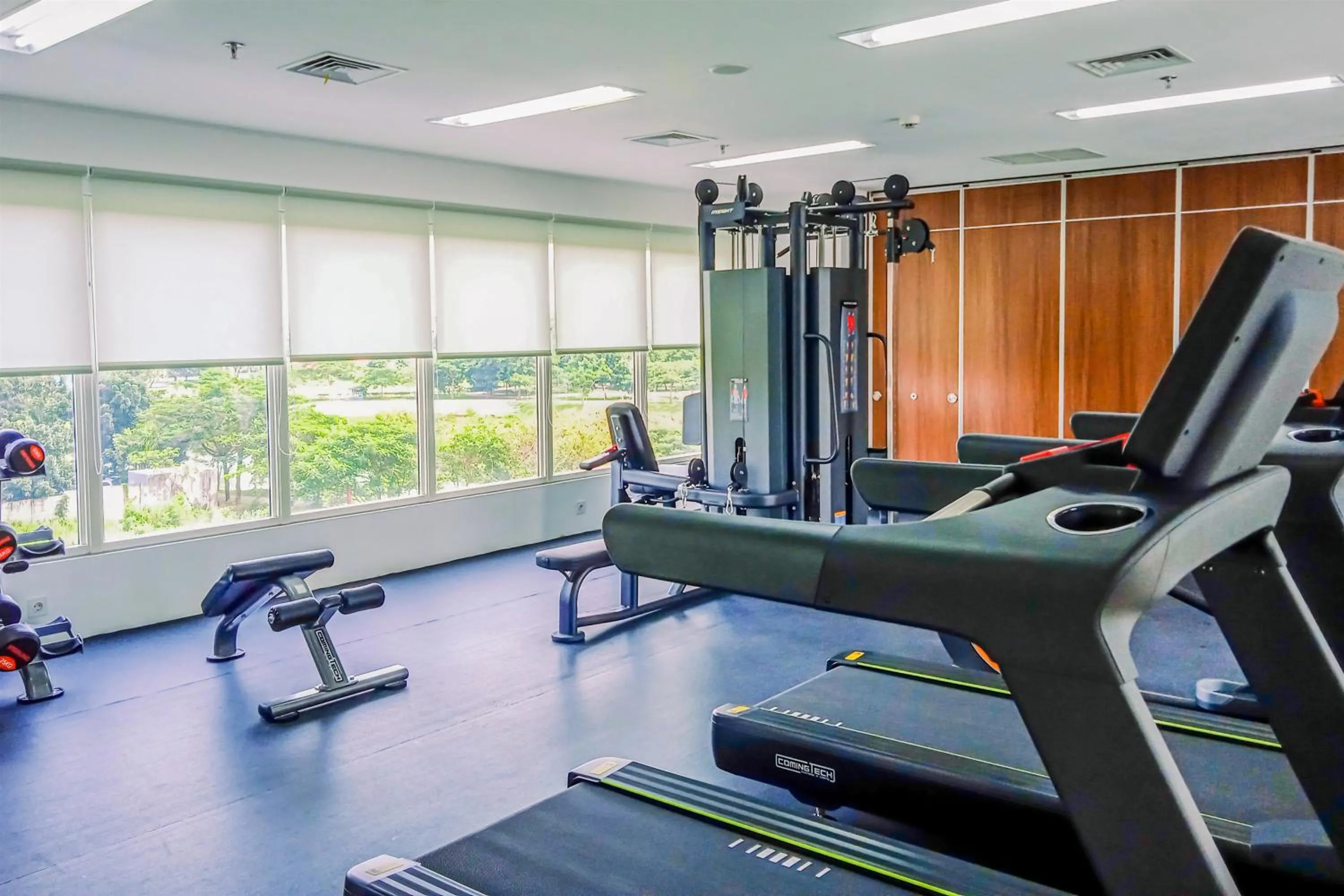 Fitness centre/facilities in Minimalist Studio Room near Campus at Pacific Garden Alam Sutera Apartment By Travelio