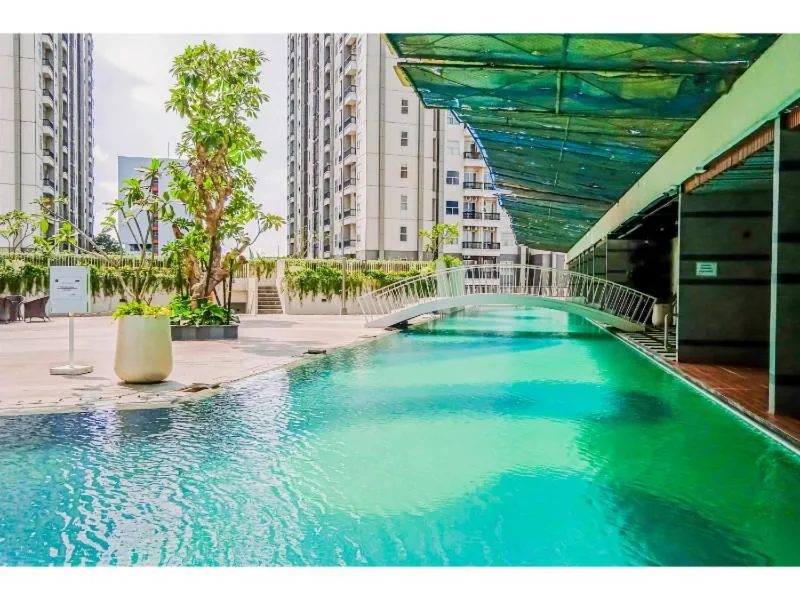Minimalist Studio Room near Campus at Pacific Garden Alam Sutera Apartment By Travelio