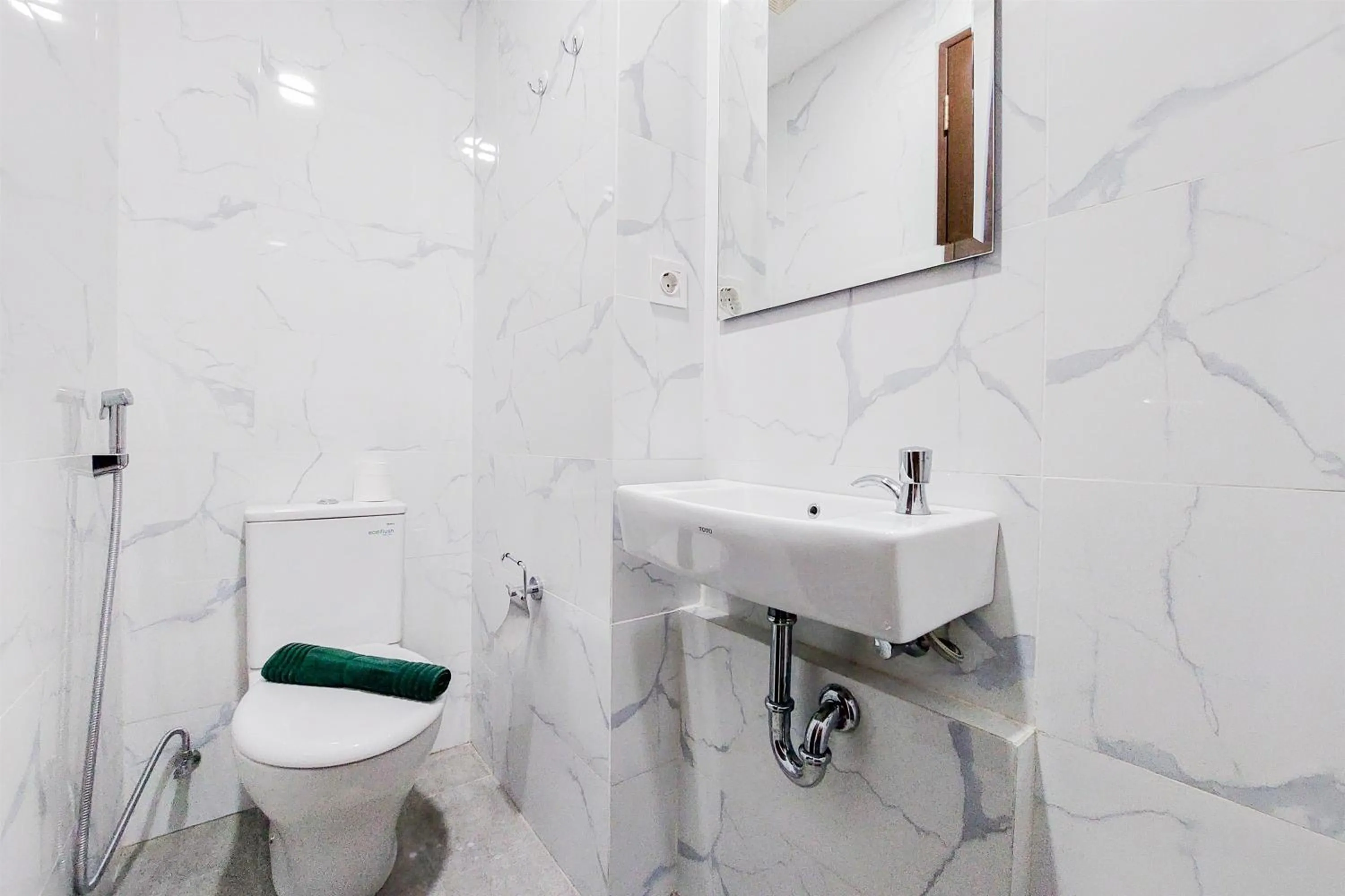 Minimalist Studio Room near Campus at Pacific Garden Alam Sutera Apartment By Travelio