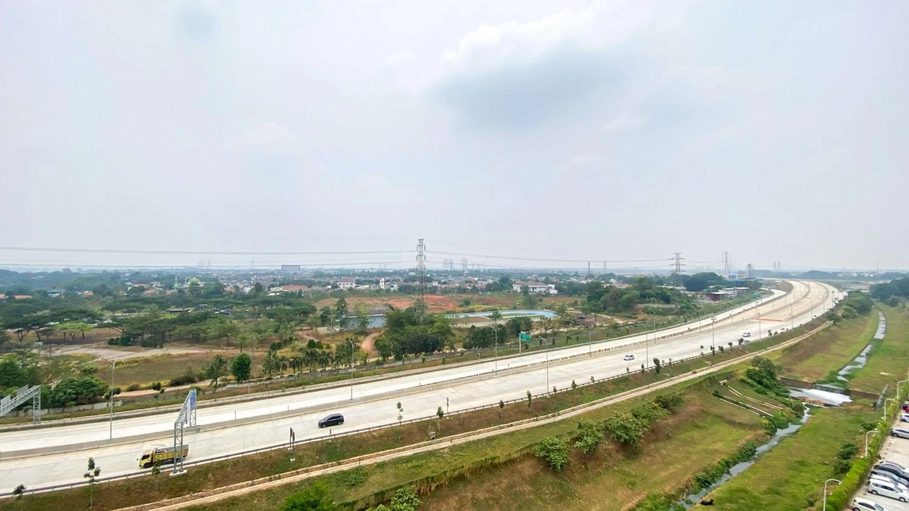 Bed in Best Choice and Nice Studio at Sky House BSD Apartment By Travelio