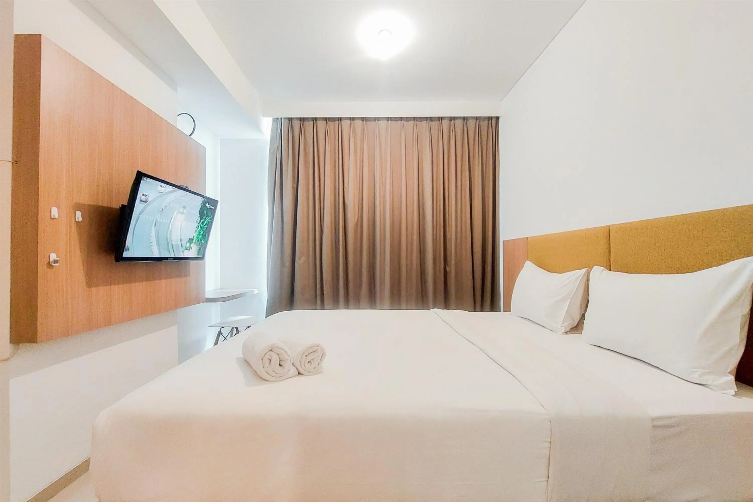 Best Deal and Homey Studio Apartment Tree Park City Cikokol By Travelio