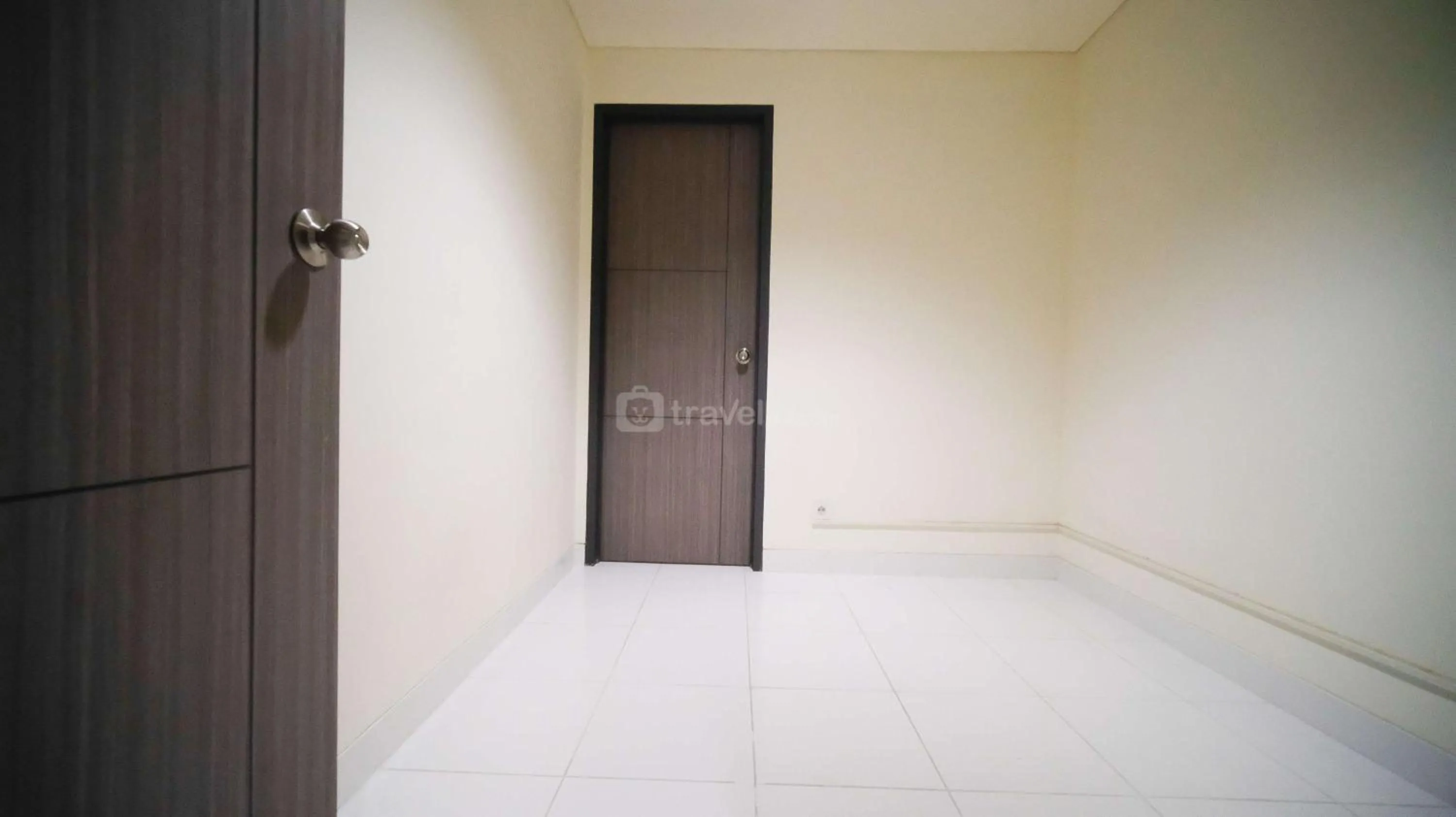 Bed in Best Location and Strategic 2BR at Praxis Apartment By Travelio