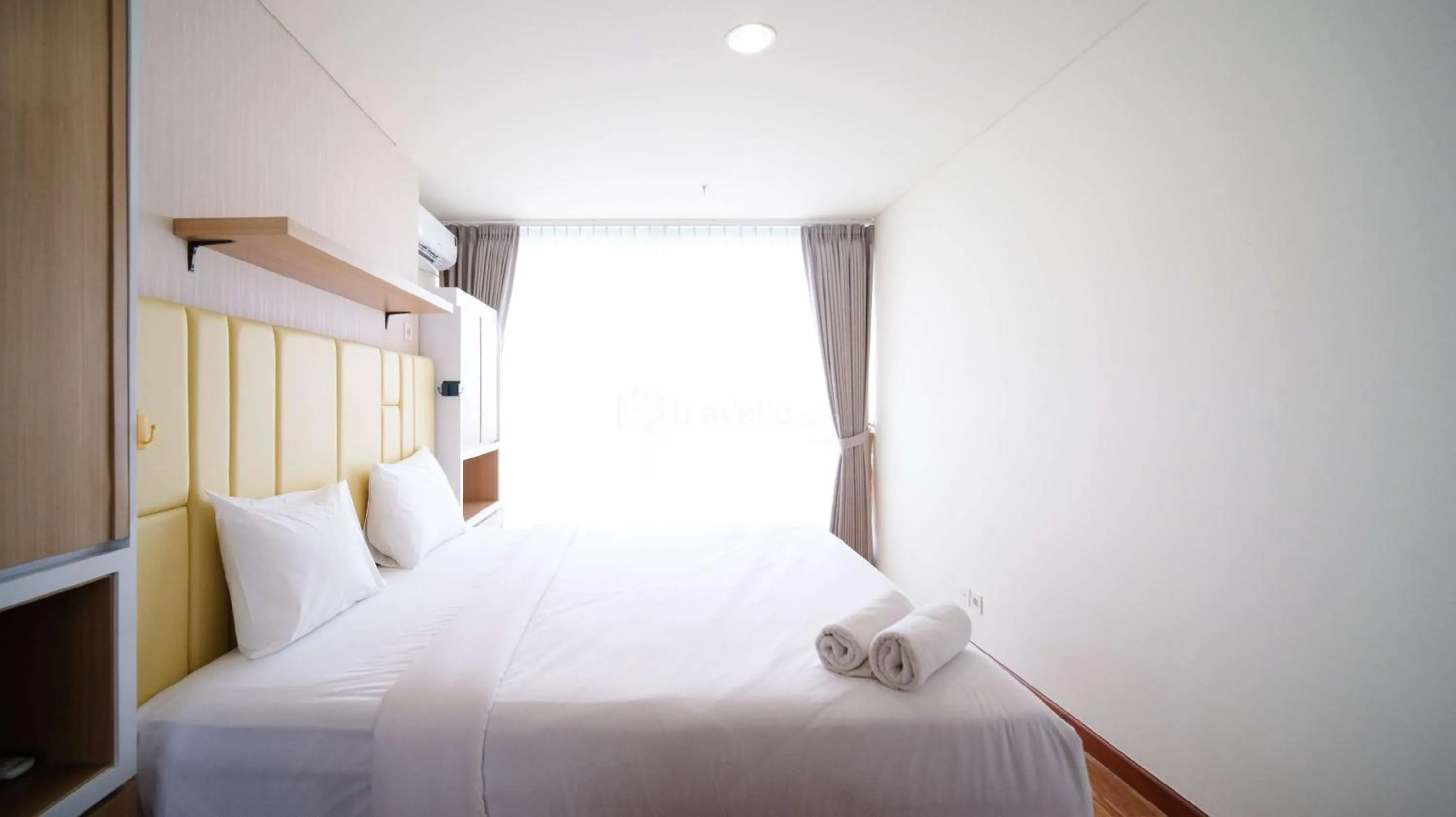 Bed in Best Location and Strategic 2BR at Praxis Apartment By Travelio