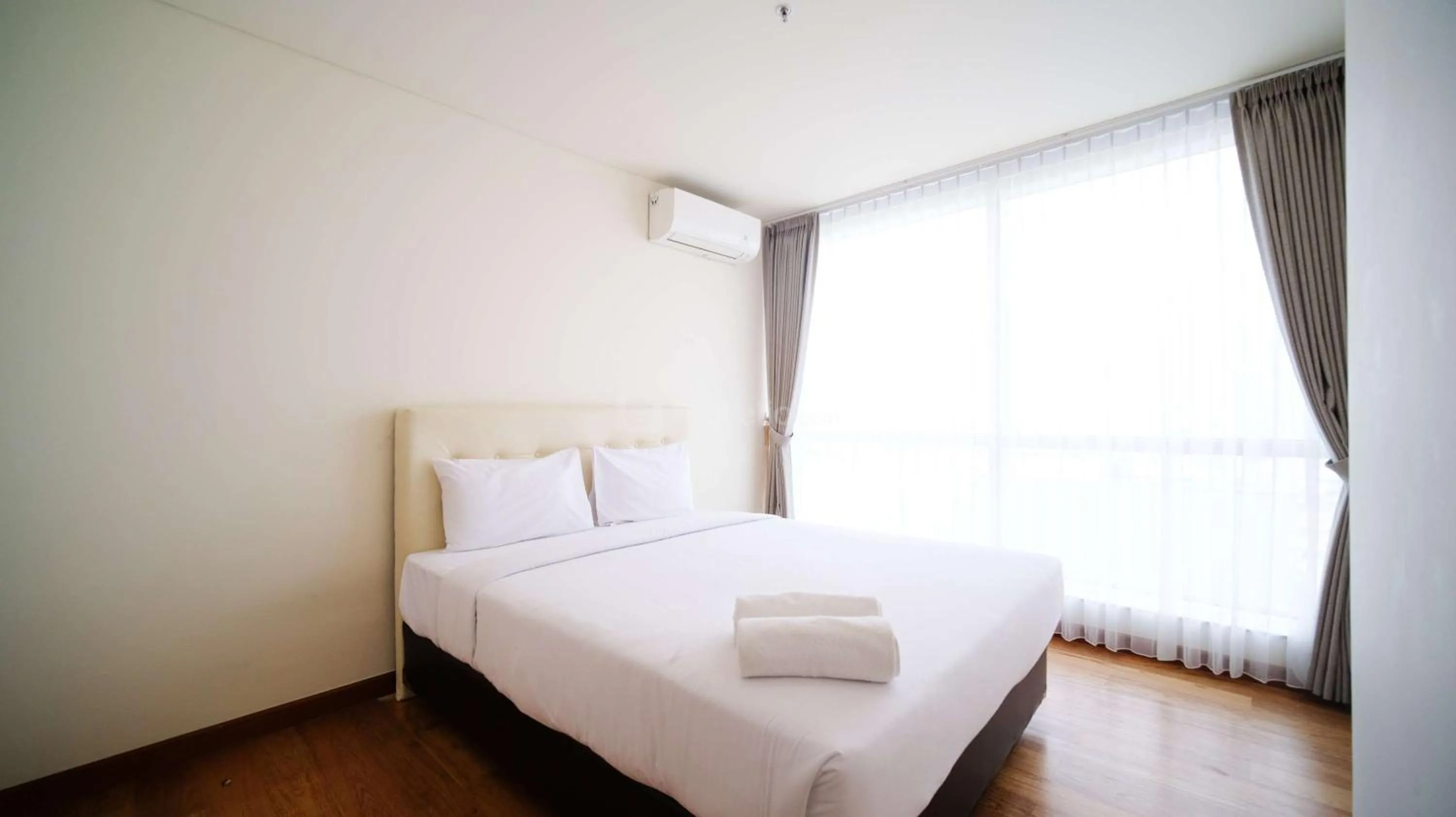 Bed in Best Location and Strategic 2BR at Praxis Apartment By Travelio
