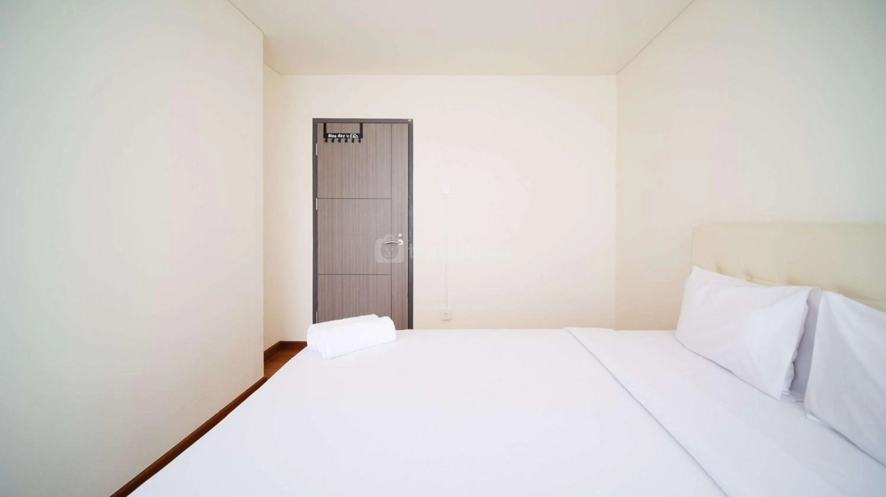 Bed in Best Location and Strategic 2BR at Praxis Apartment By Travelio