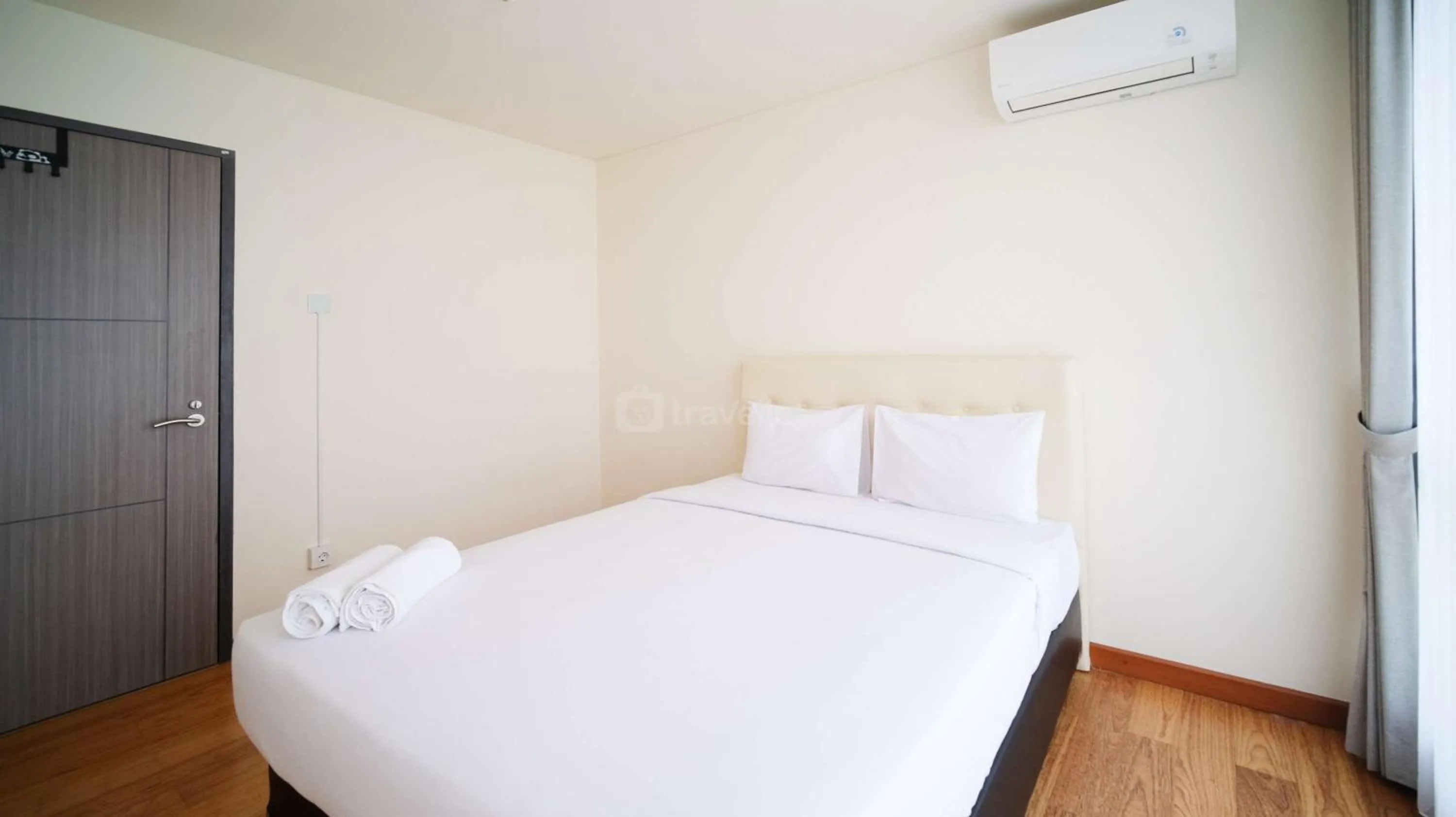 Bed in Best Location and Strategic 2BR at Praxis Apartment By Travelio