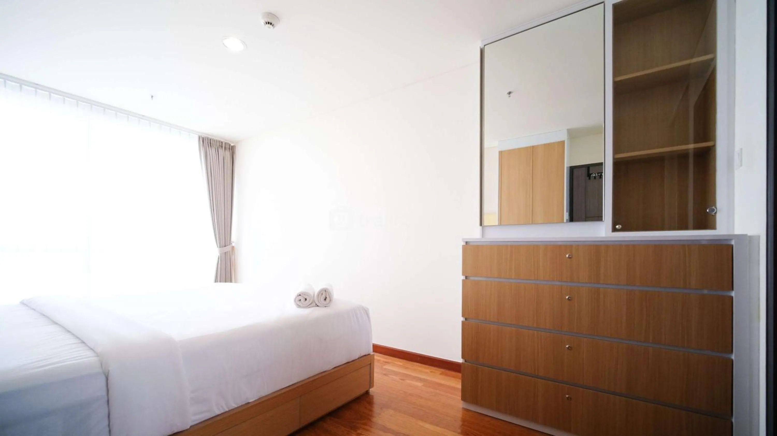 Bed in Best Location and Strategic 2BR at Praxis Apartment By Travelio