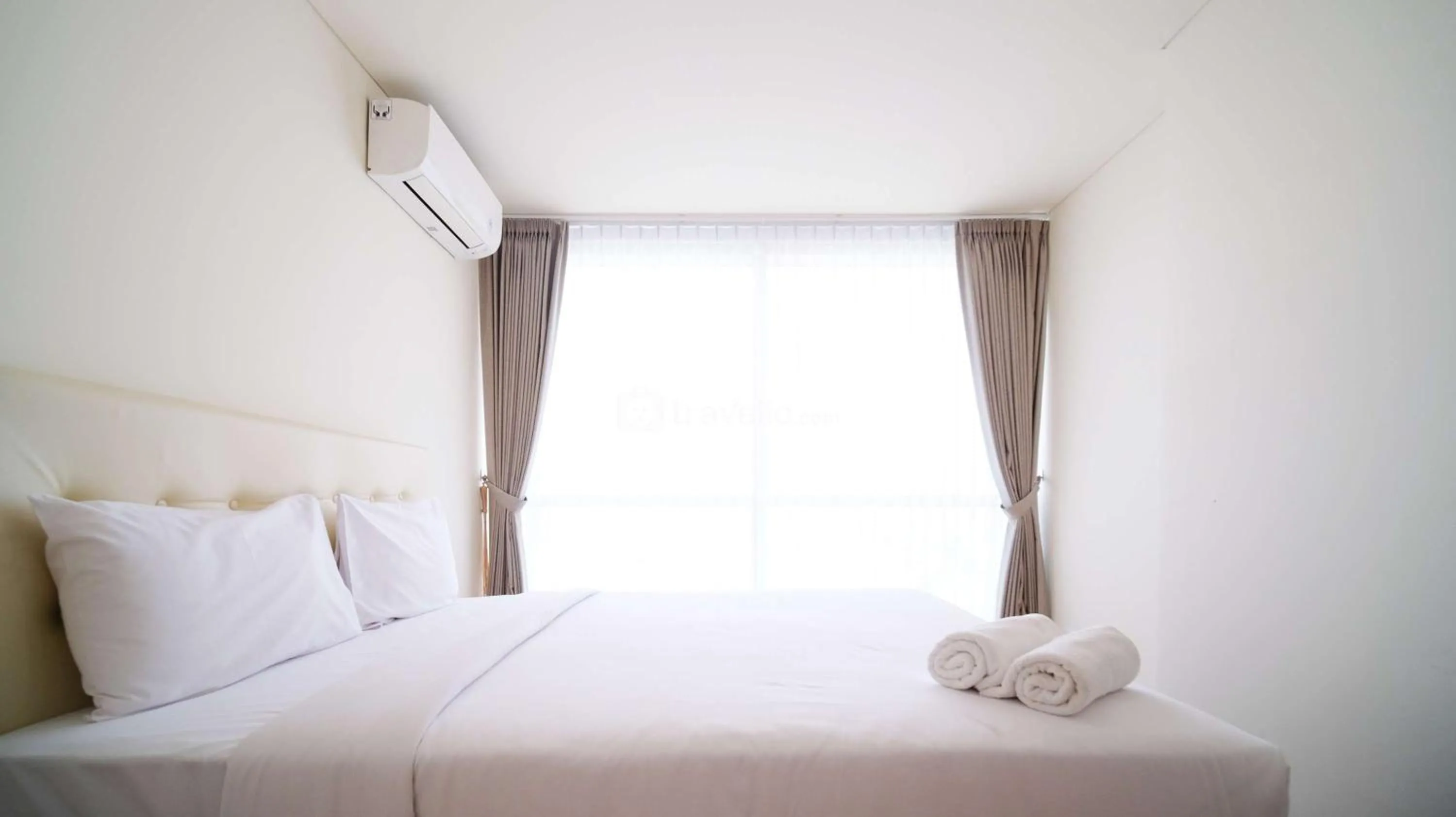 Bed in Best Location and Strategic 2BR at Praxis Apartment By Travelio