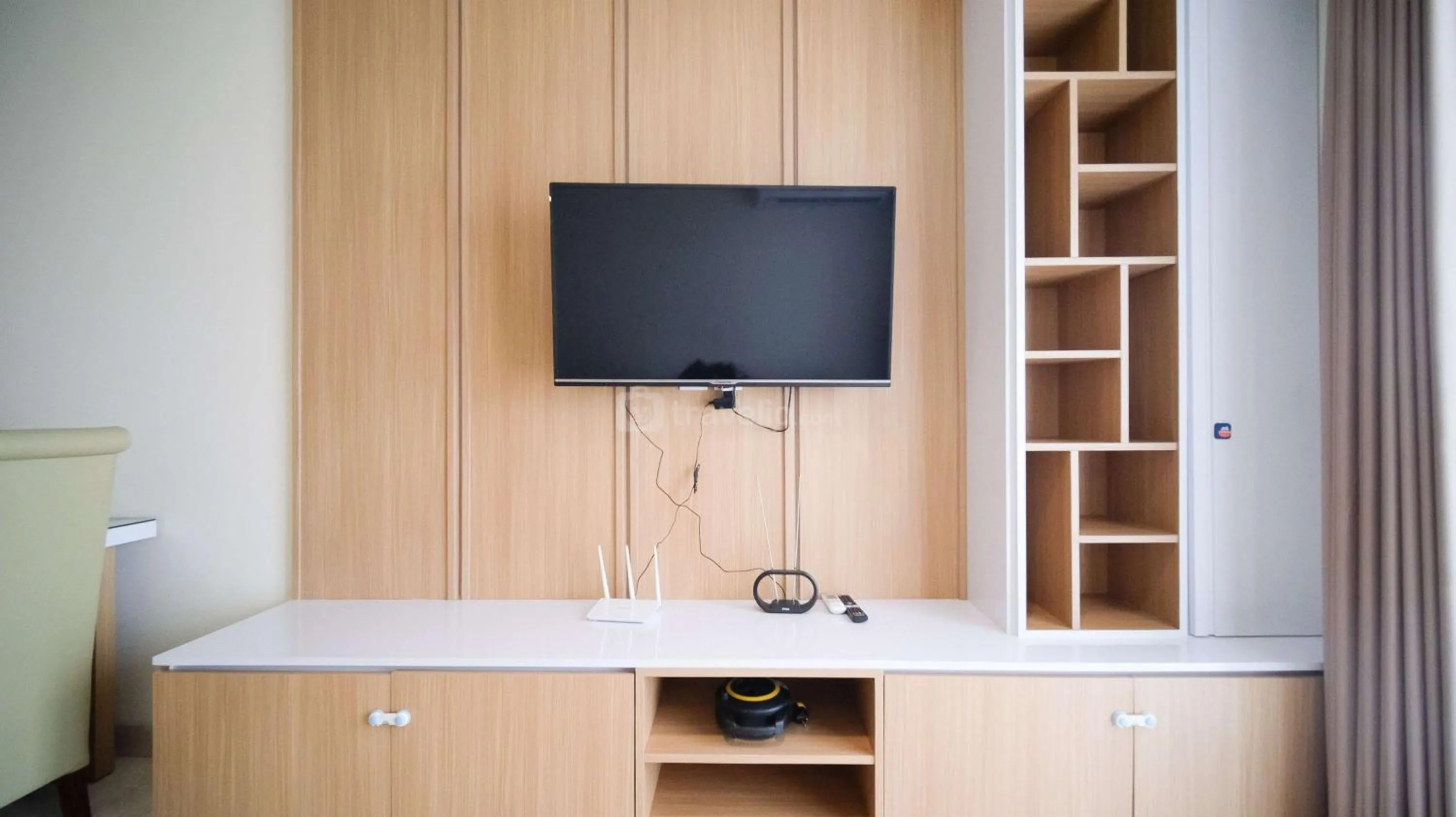 Bed in Best Location and Strategic 2BR at Praxis Apartment By Travelio