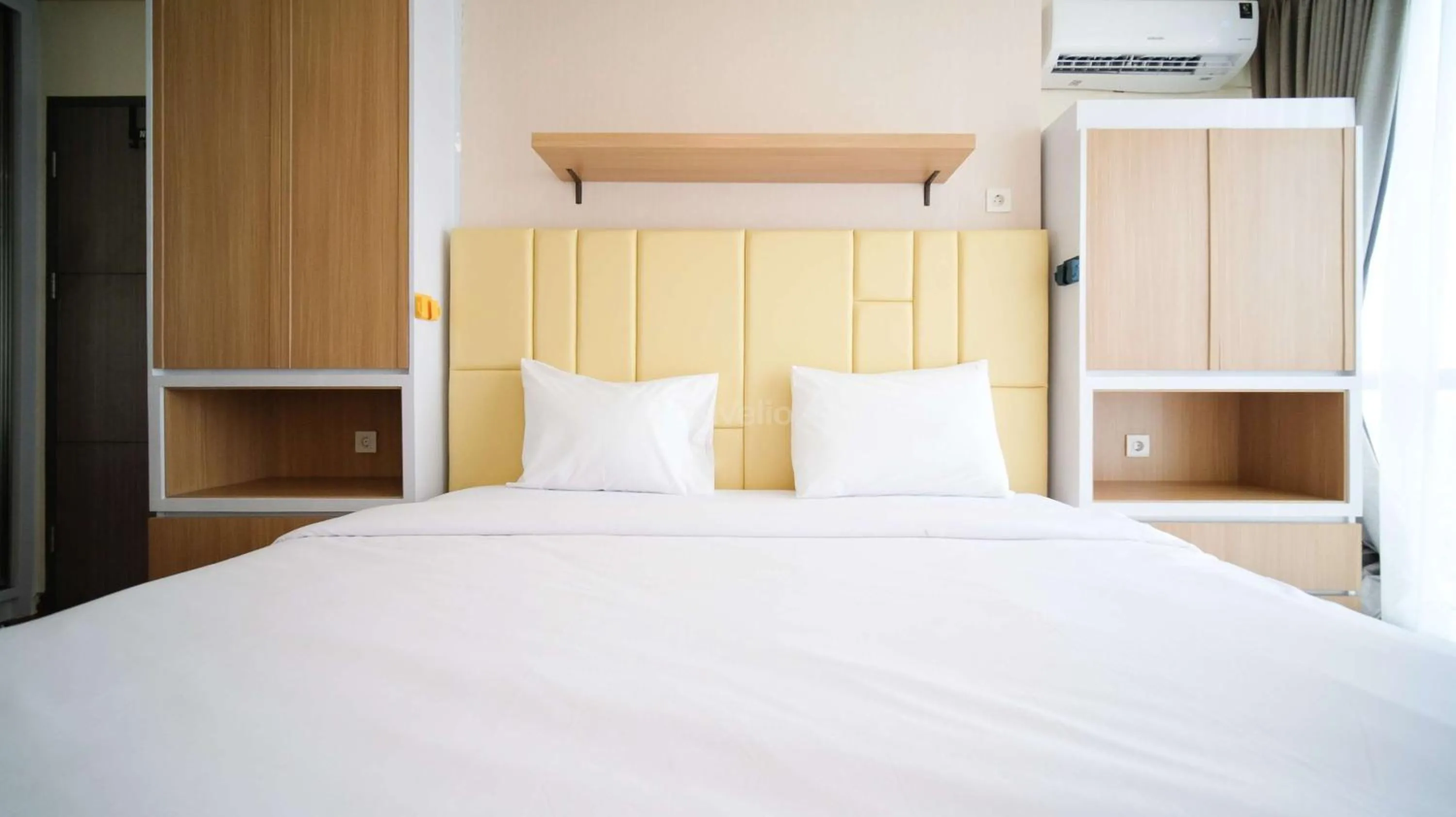 Bedroom, Bed in Best Location and Strategic 2BR at Praxis Apartment By Travelio