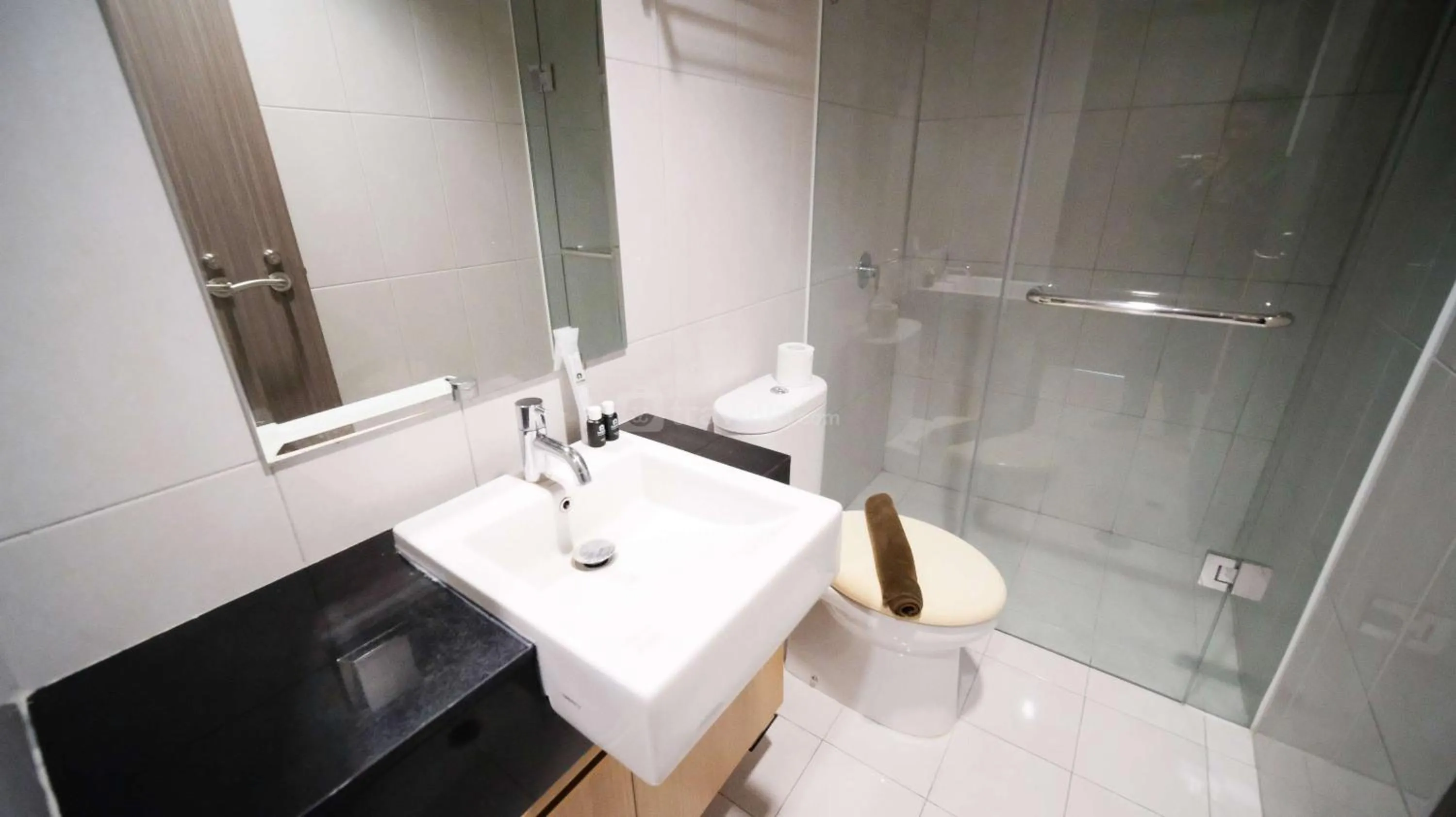 Bed in Best Location and Strategic 2BR at Praxis Apartment By Travelio
