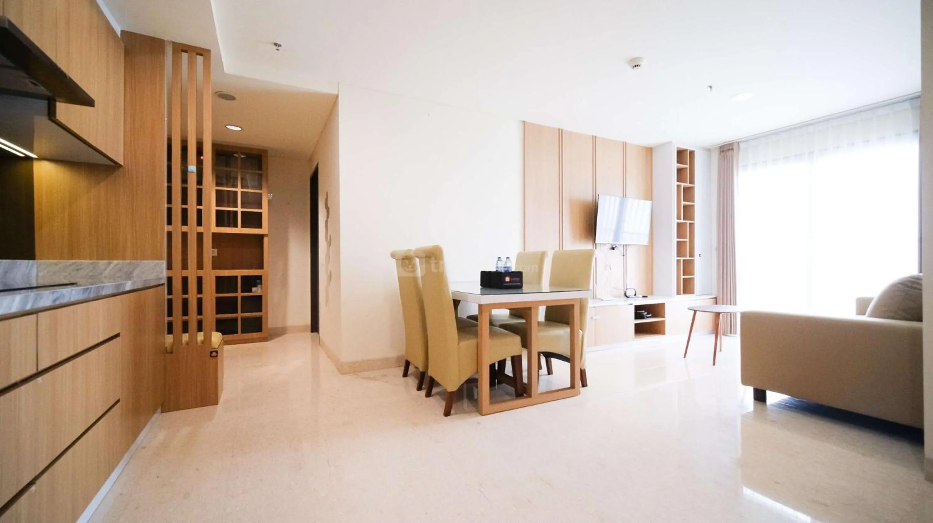Bed in Best Location and Strategic 2BR at Praxis Apartment By Travelio