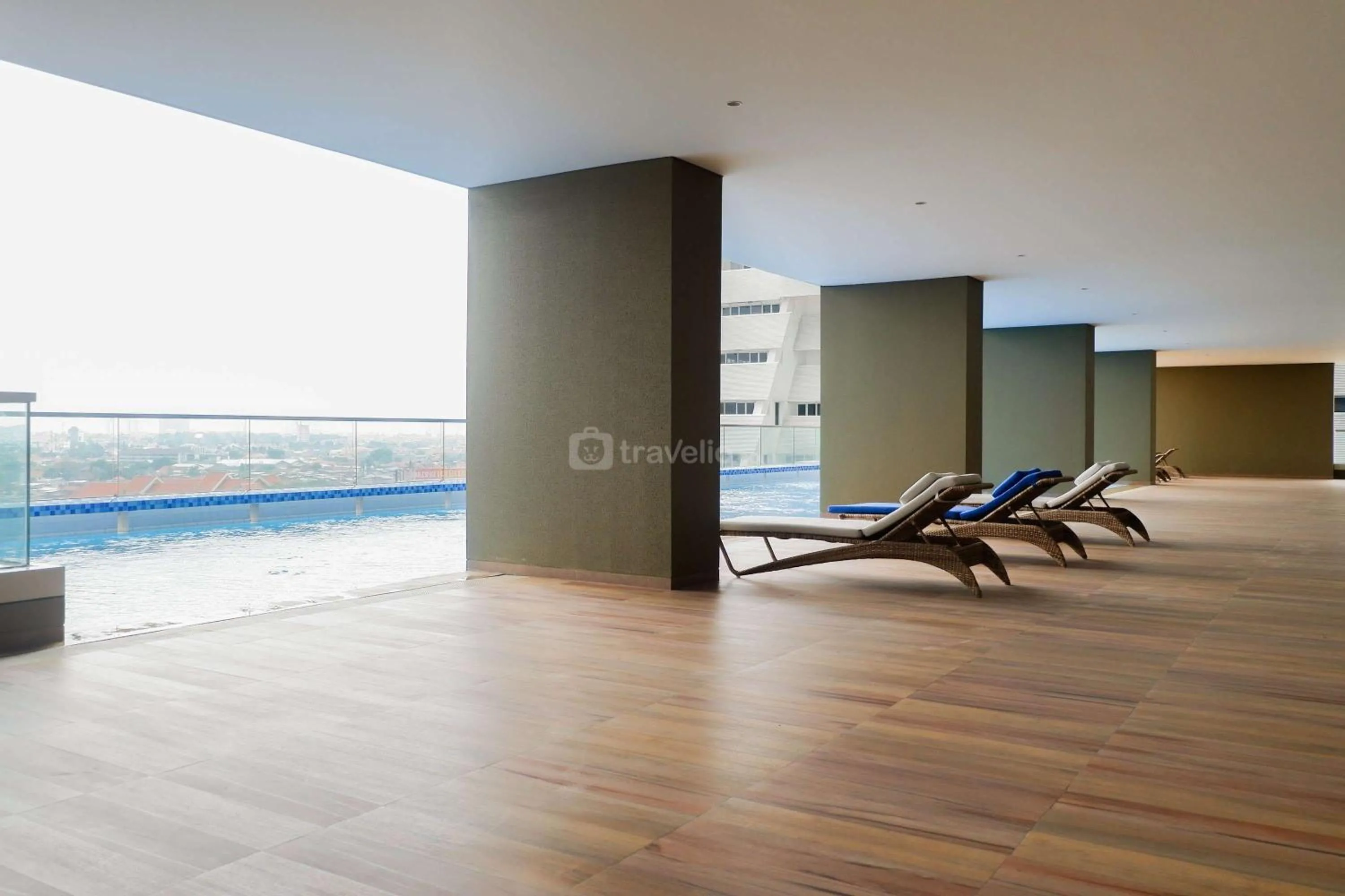 Property building in Best Location and Strategic 2BR at Praxis Apartment By Travelio
