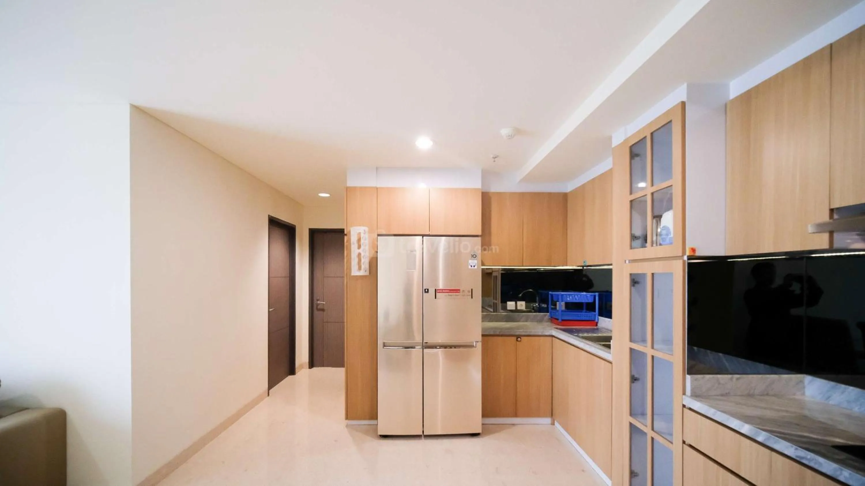 Kitchen or kitchenette in Best Location and Strategic 2BR at Praxis Apartment By Travelio