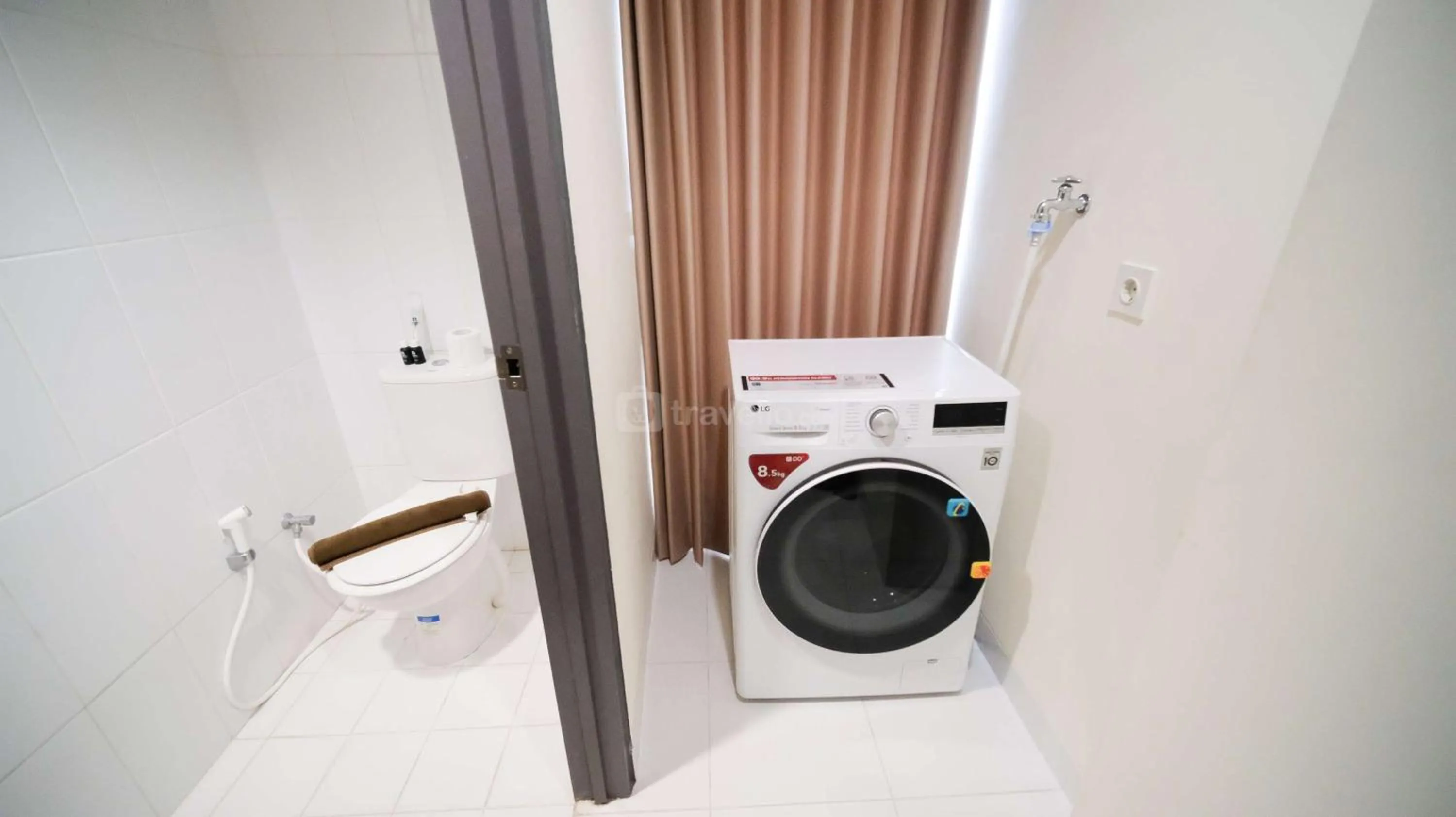 Bed in Best Location and Strategic 2BR at Praxis Apartment By Travelio