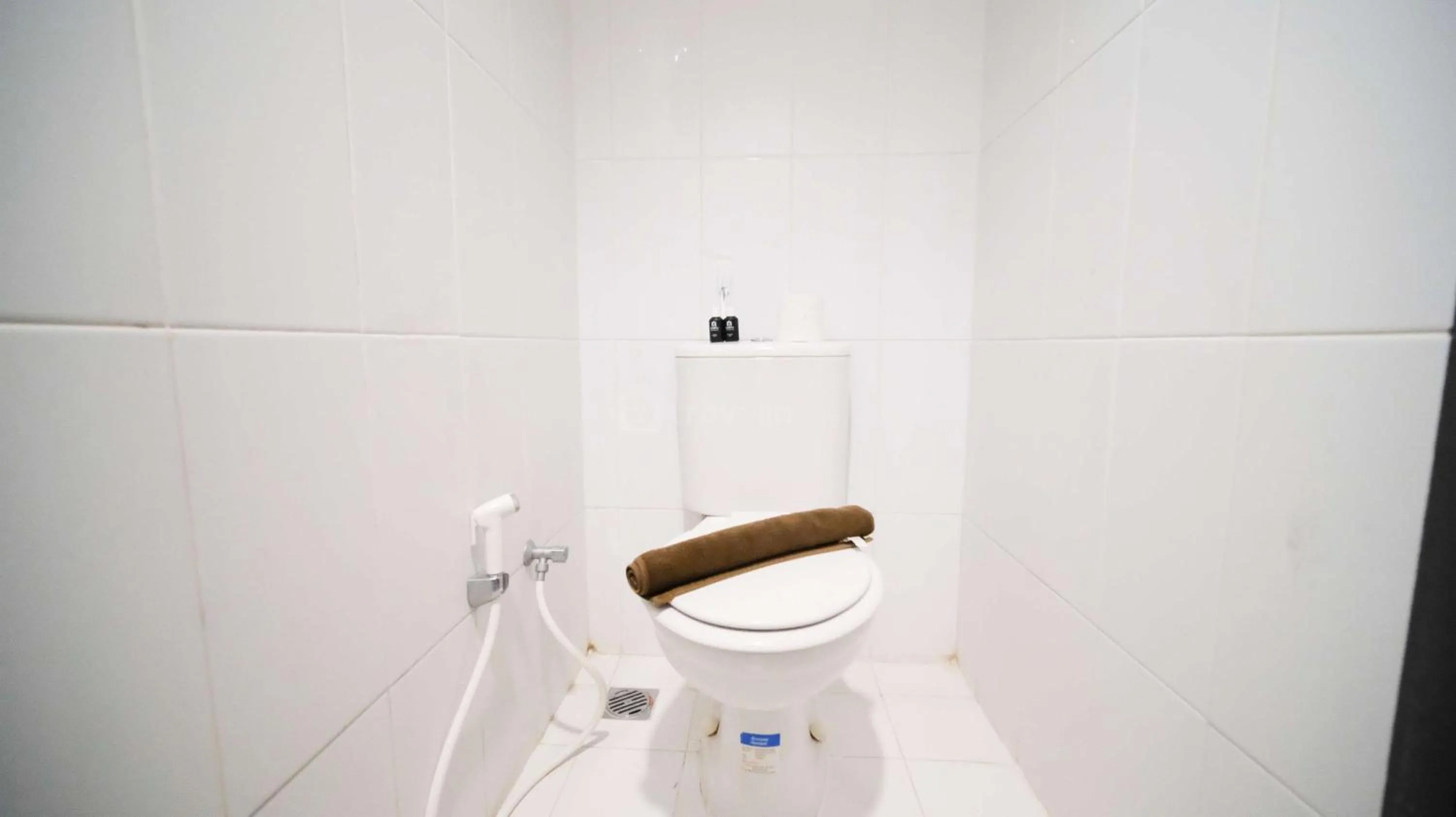 Bed in Best Location and Strategic 2BR at Praxis Apartment By Travelio