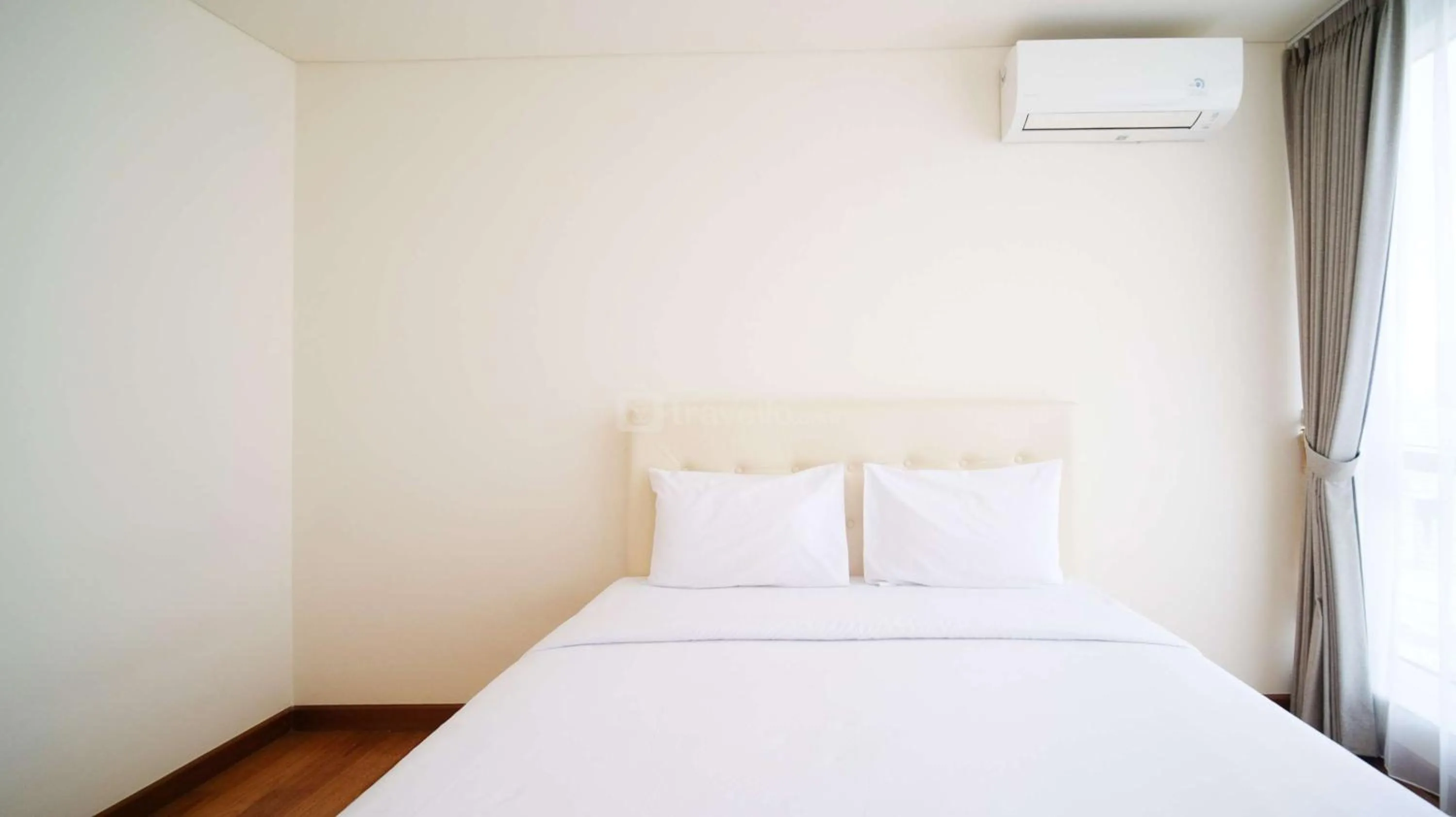 Bed in Best Location and Strategic 2BR at Praxis Apartment By Travelio