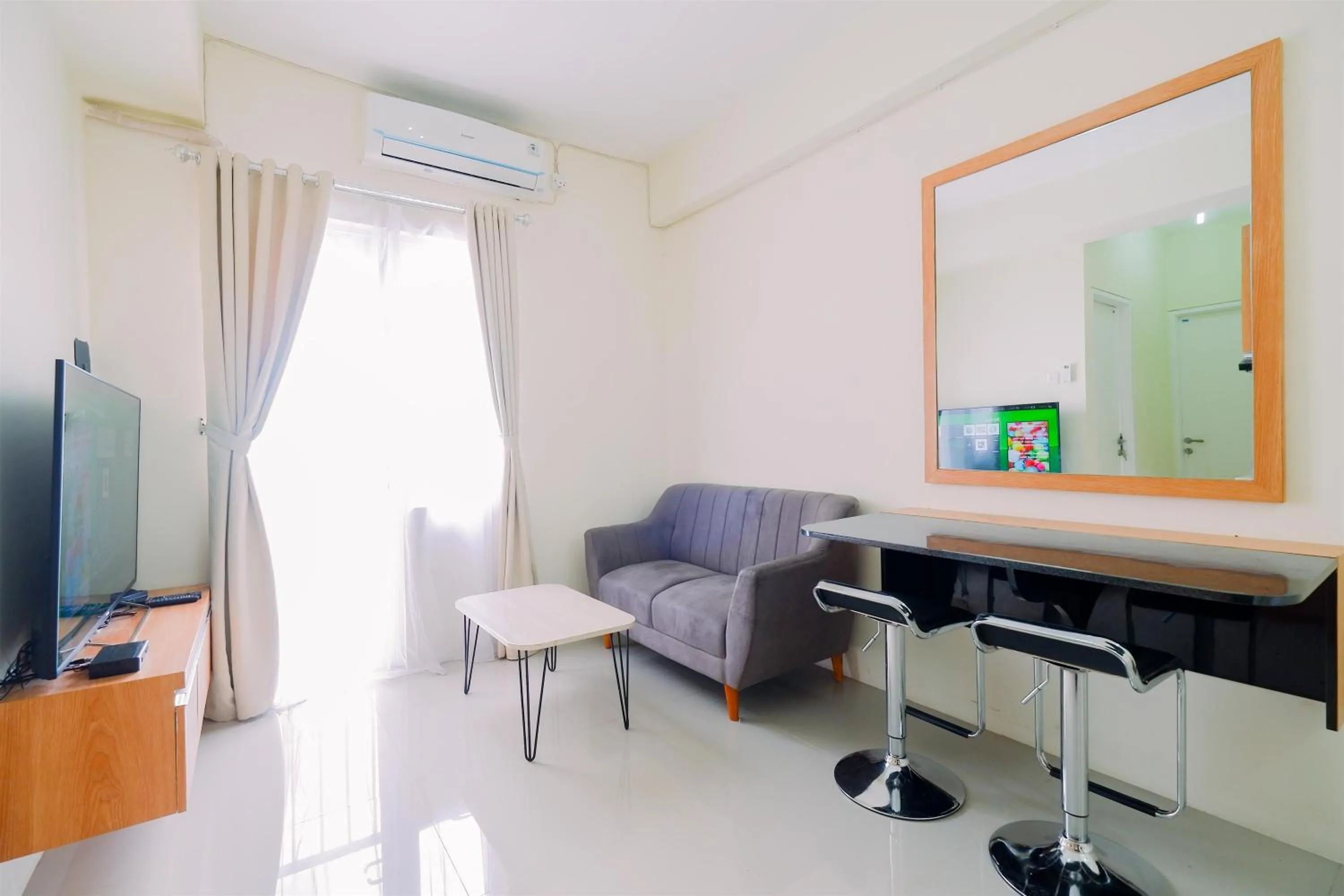 Warm and Cozy Living 2BR Bogorienze Apartment By Travelio